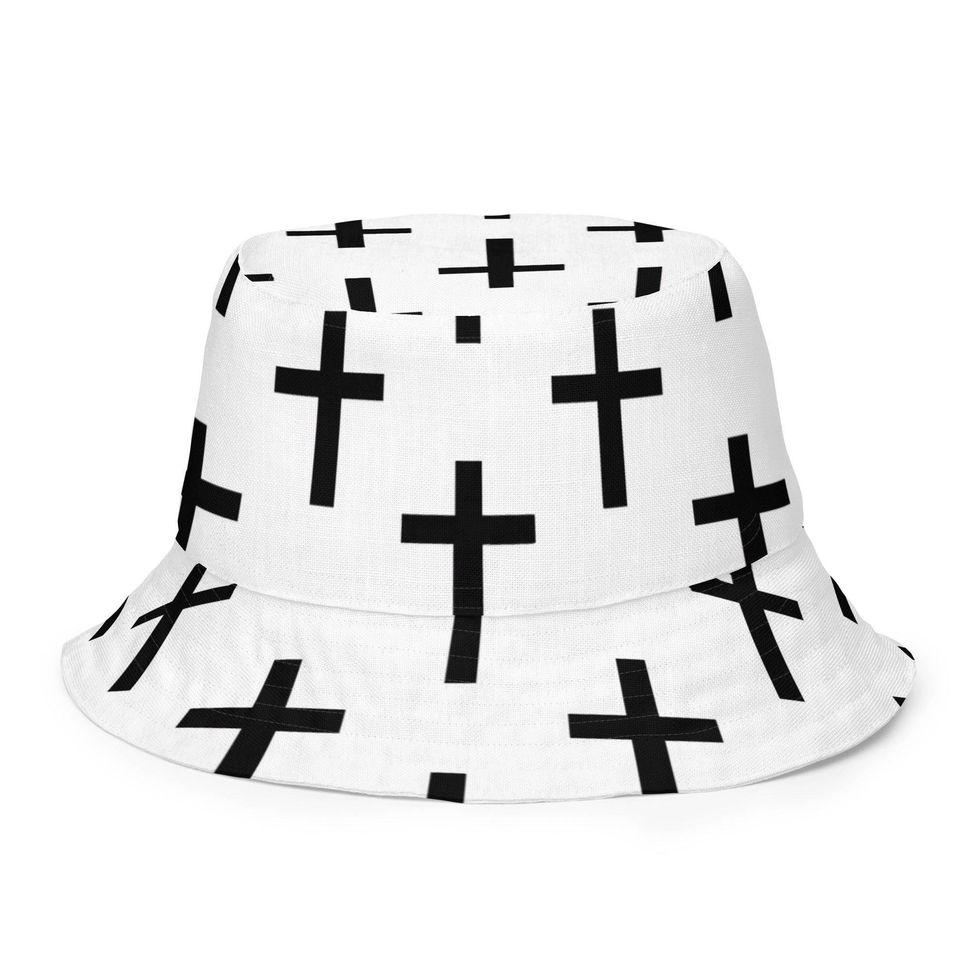 Reversible bucket hat featuring a white and black cross print, showcasing its stylish design and premium fabric.