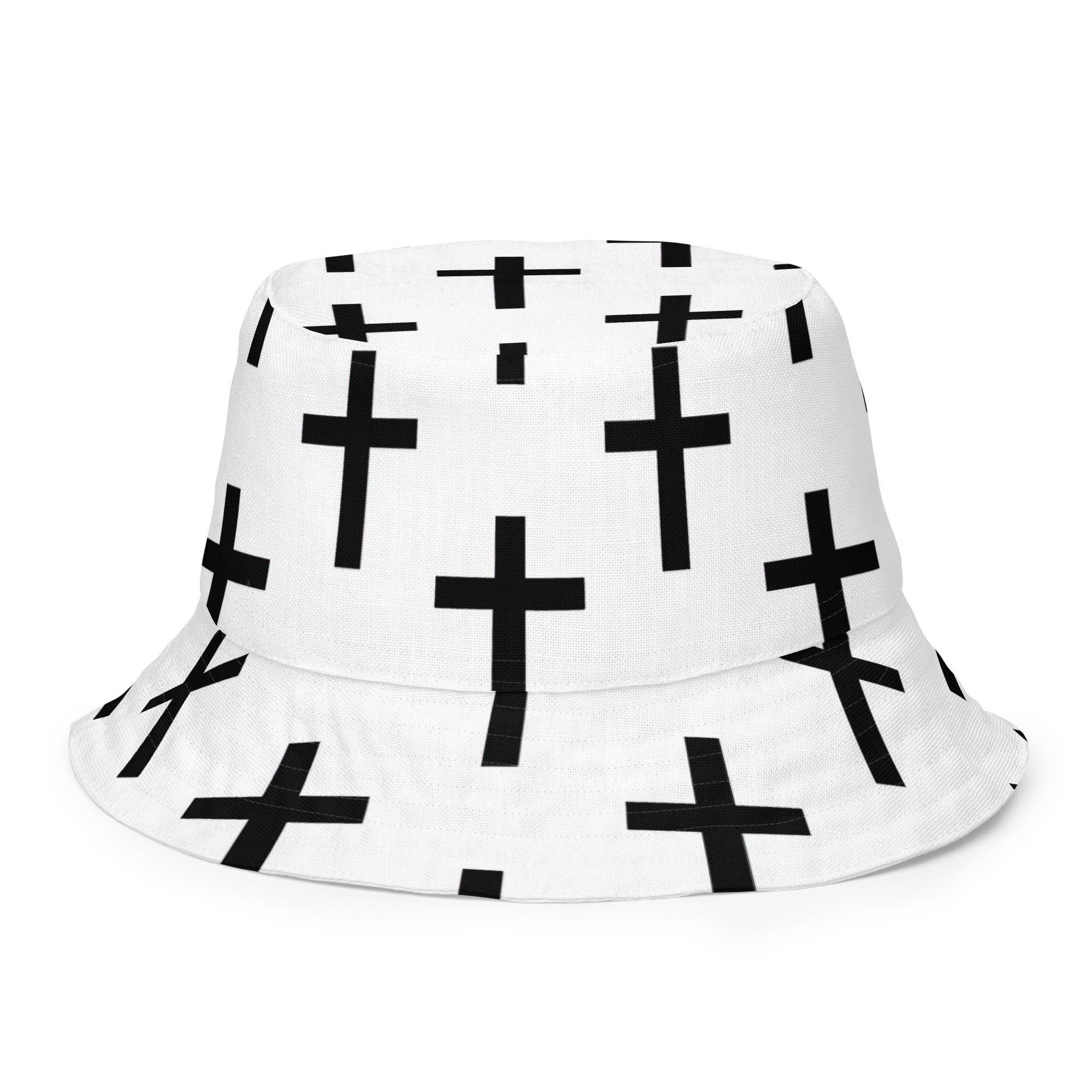 Reversible bucket hat featuring a white and black cross print, showcasing its stylish design and premium fabric.