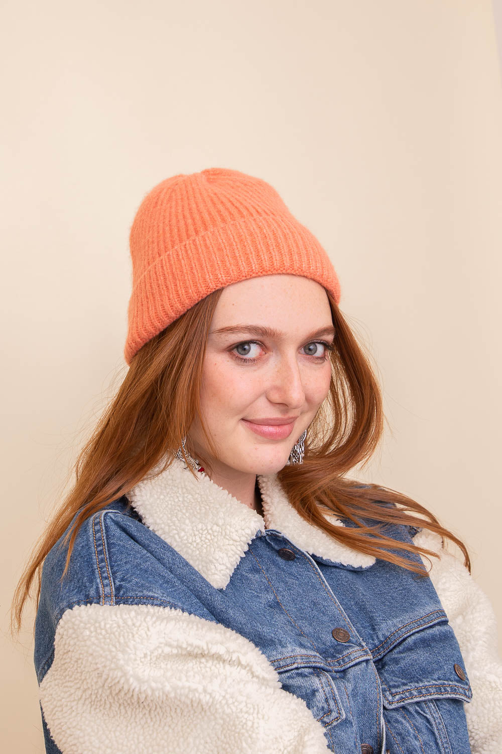 A cozy Rib Knit Cuffed Beanie in various colors, showcasing its soft texture and stylish cuff detail.