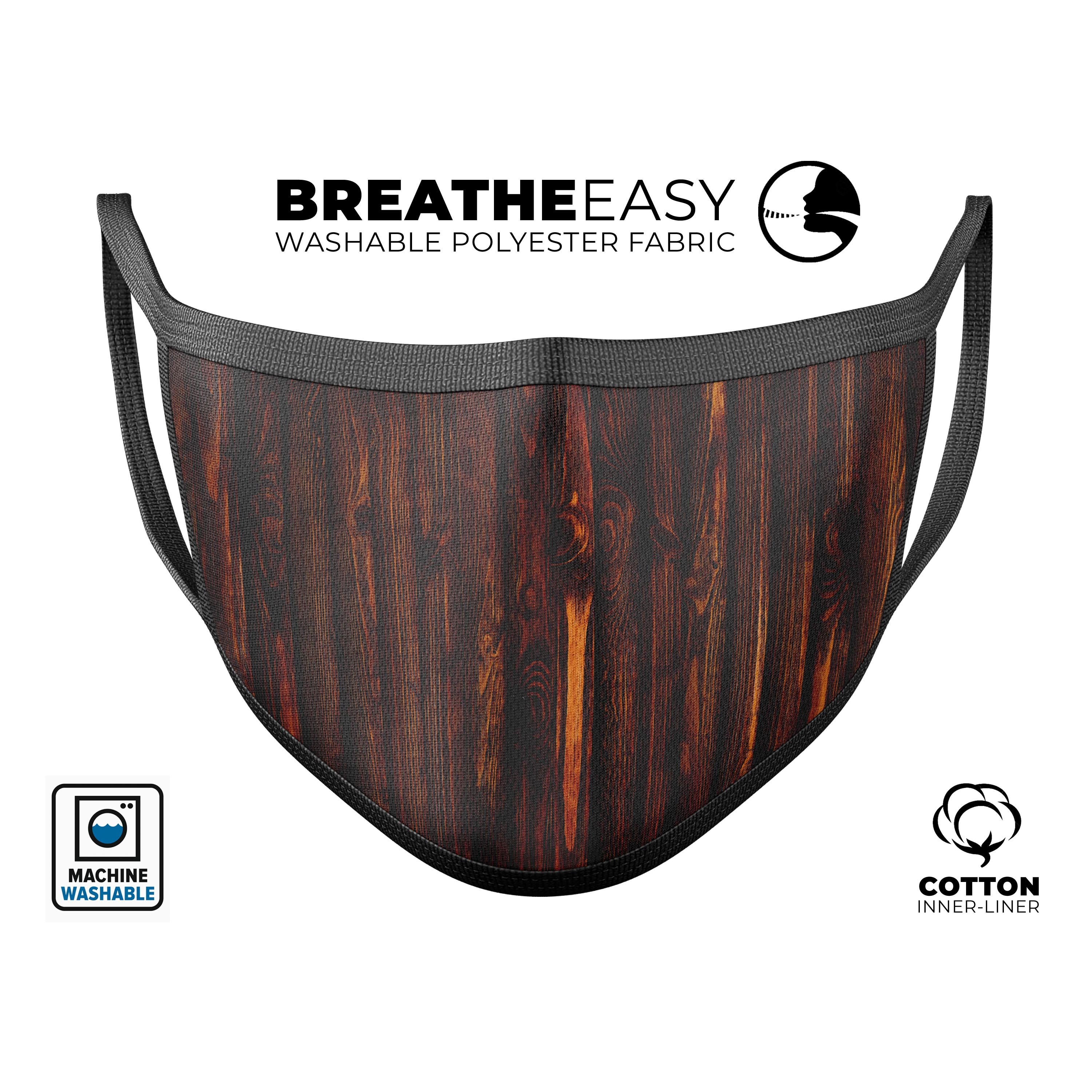 Unisex anti-dust mouth cover made from polyester and cotton, featuring adjustable ear loops and vibrant dye-sublimated design, made in the USA.