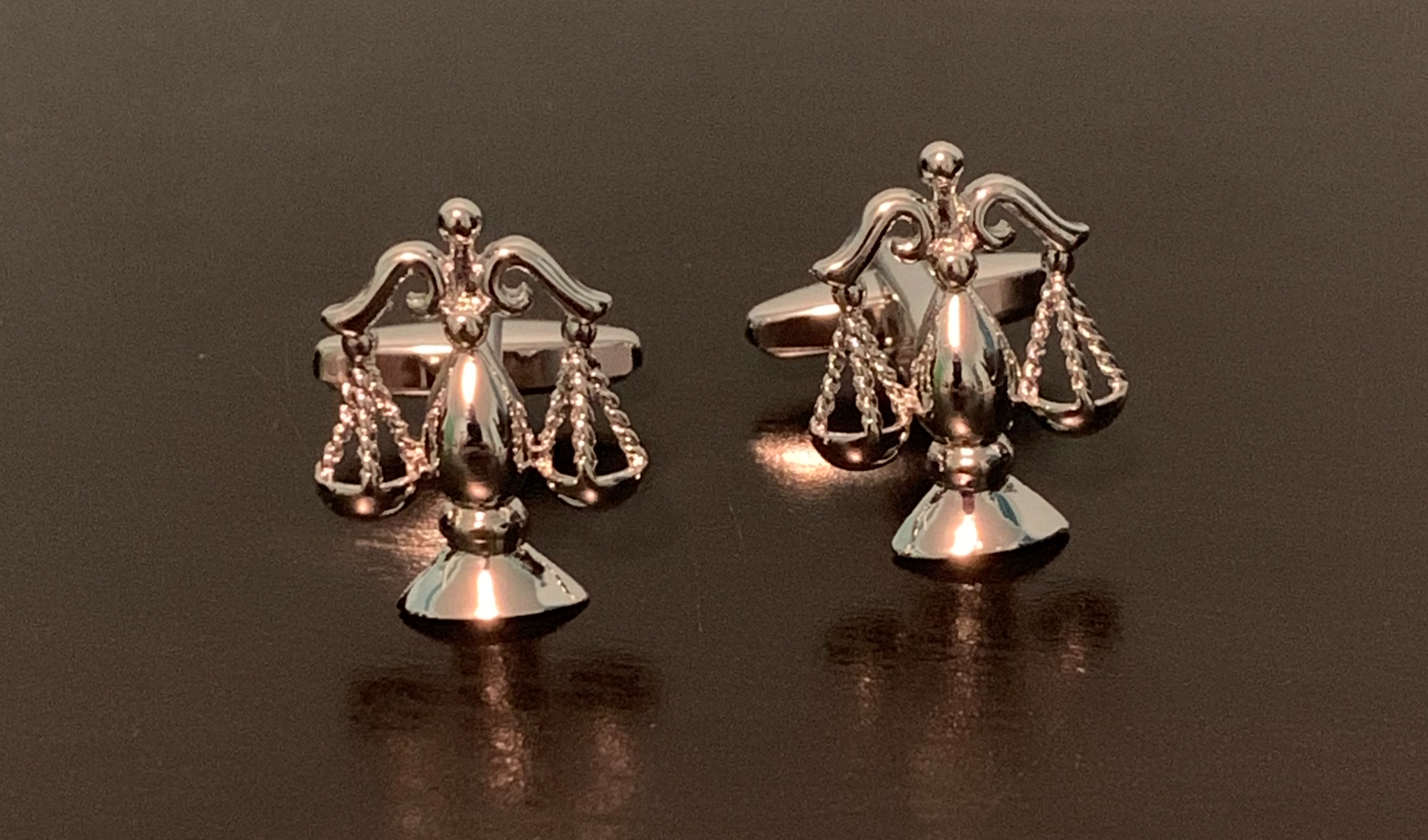 Rogue Justice Cufflinks featuring a stylish scales of justice design, perfect for the modern gentleman.