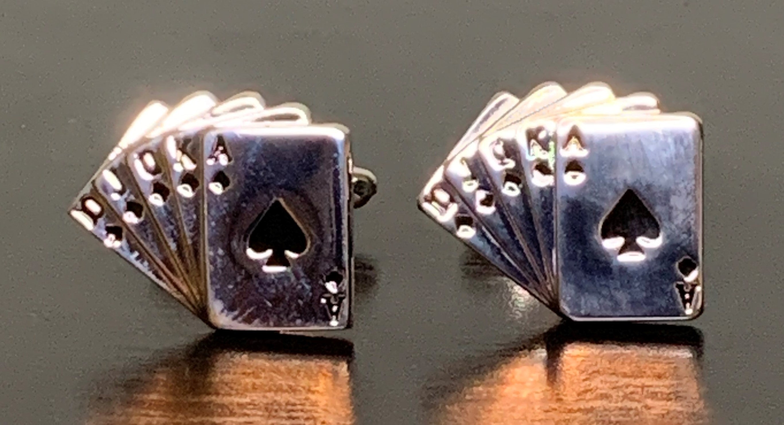 Stylish Rogue Royal Flush Cufflinks featuring a royal flush playing card design, perfect for gentlemen.