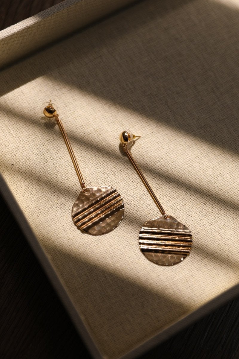 Elegant Roman Coin Earrings featuring a dangle drop design with intricate coin details, perfect for enhancing any outfit.