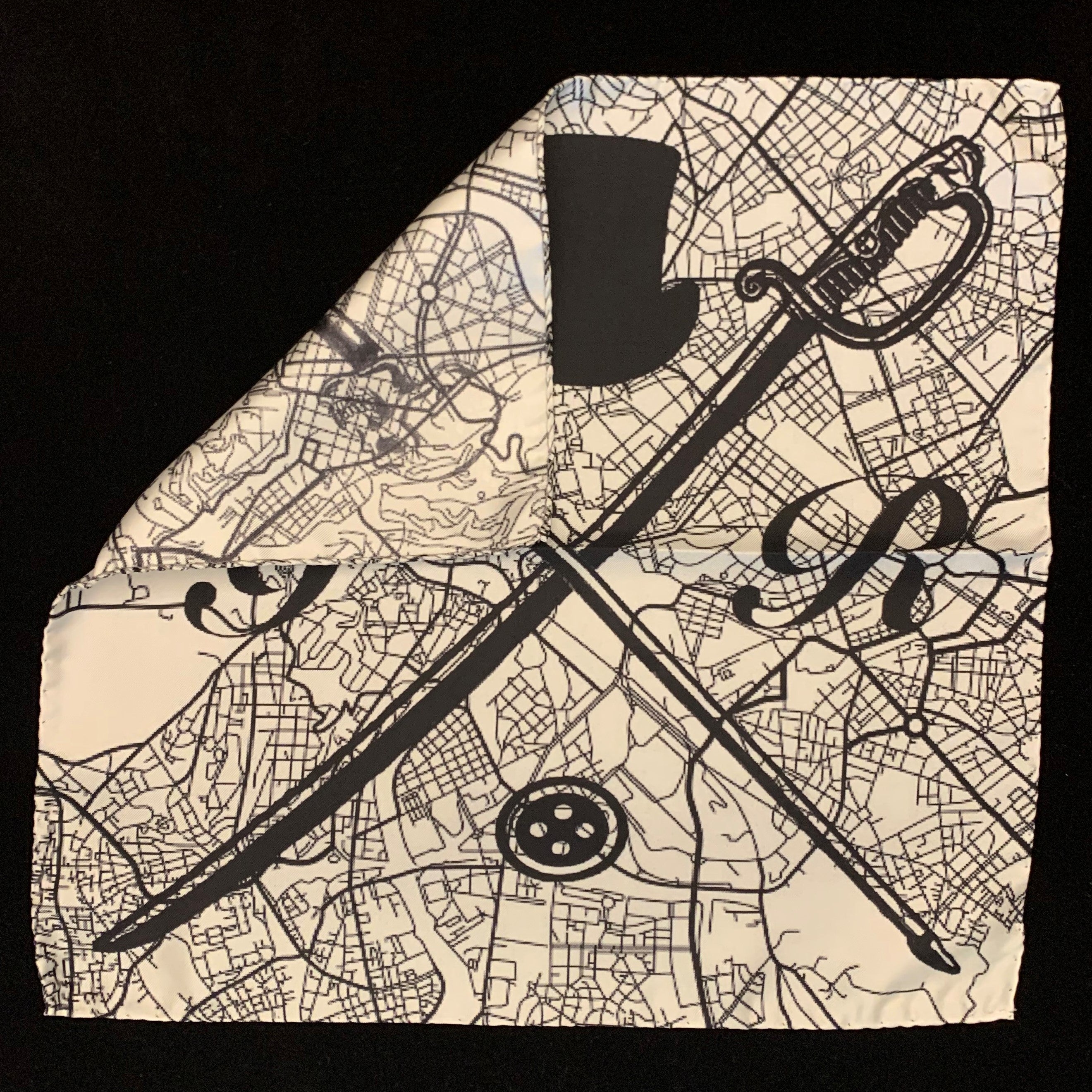 Elegant black and white silk pocket square featuring a detailed Rome street map design and Gentleman Rogue logo.