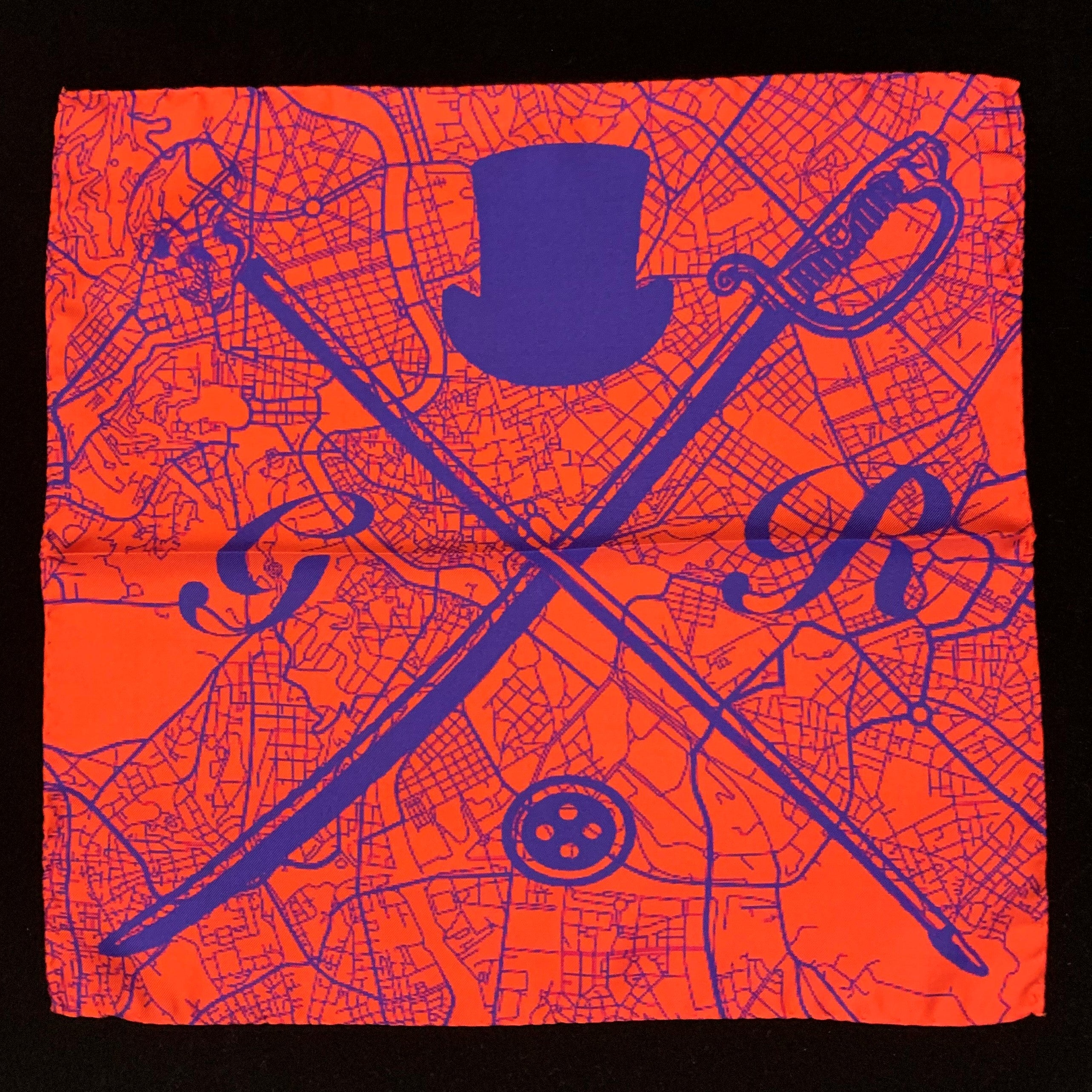 Burnt orange pocket square featuring a detailed map of Rome with Gentleman Rogue logo.