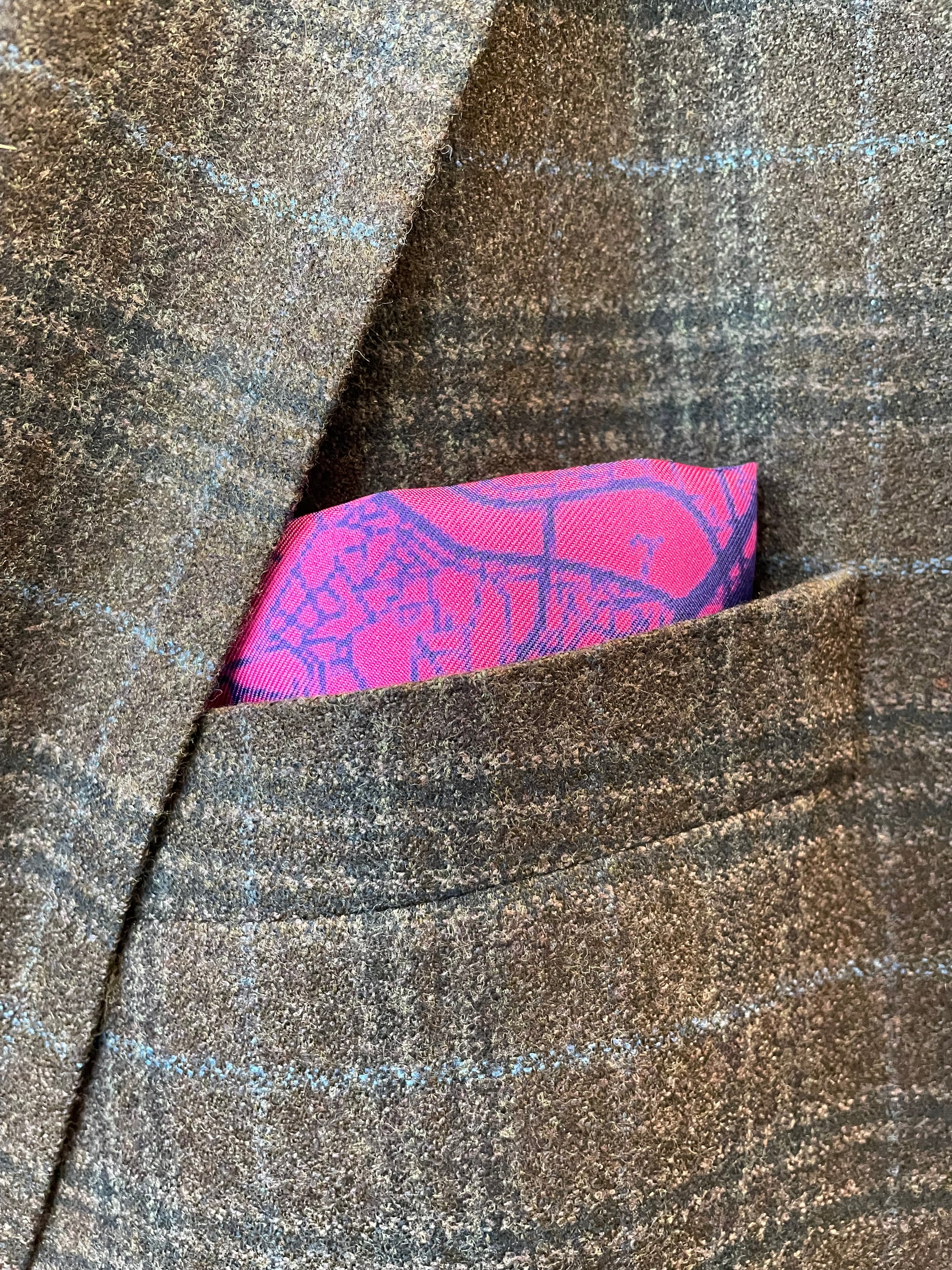 Rome Street Map Magenta Pocket Square featuring a vibrant street map design and Gentleman Rogue logo, made from 100% silk.