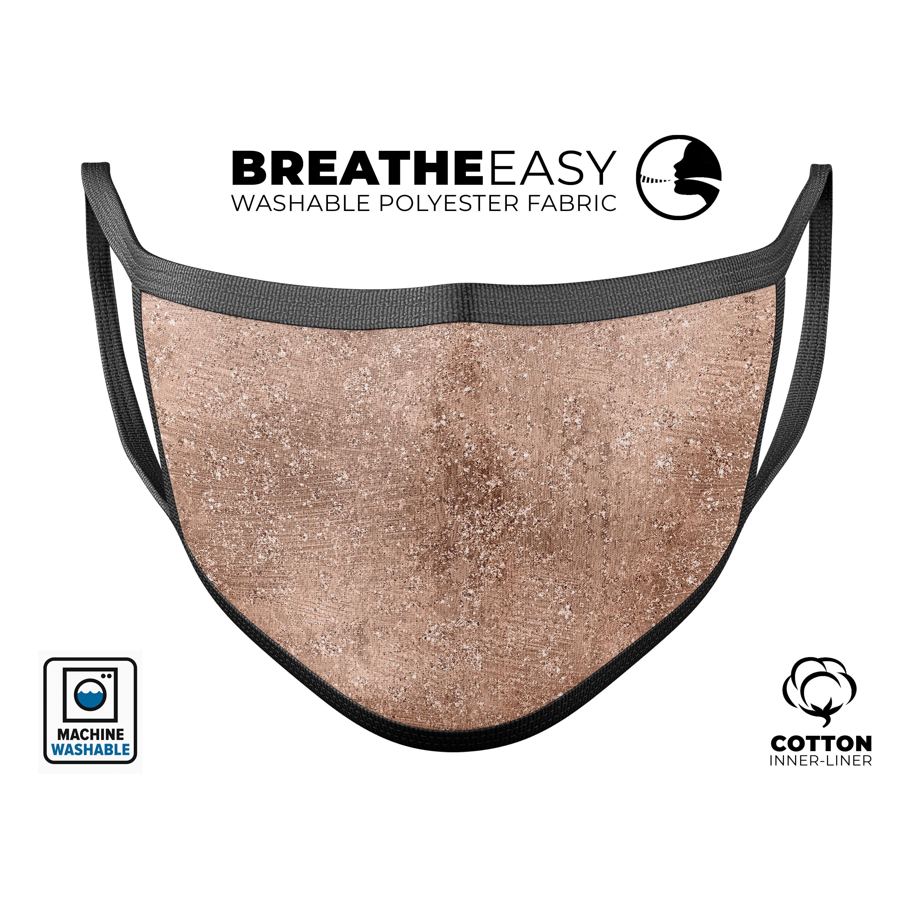 Rose Gold Scratched mouth cover, made in the USA, featuring adjustable ear-loops and a comfortable cotton interior.