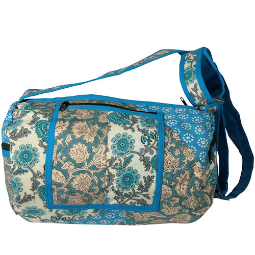 Round Patchwork Sports Bag with zipper pockets and adjustable strap, handmade by youth artisans at Lakshya shelter in India.