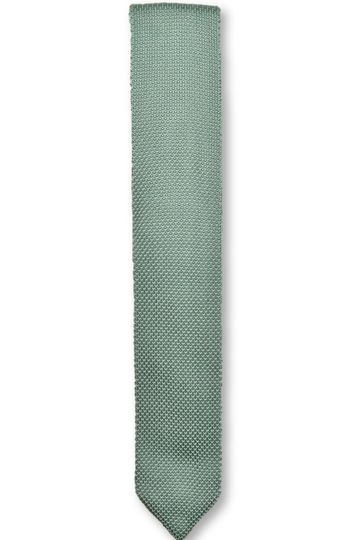 Sage green knitted tie with a pointed end, showcasing its texture and color.