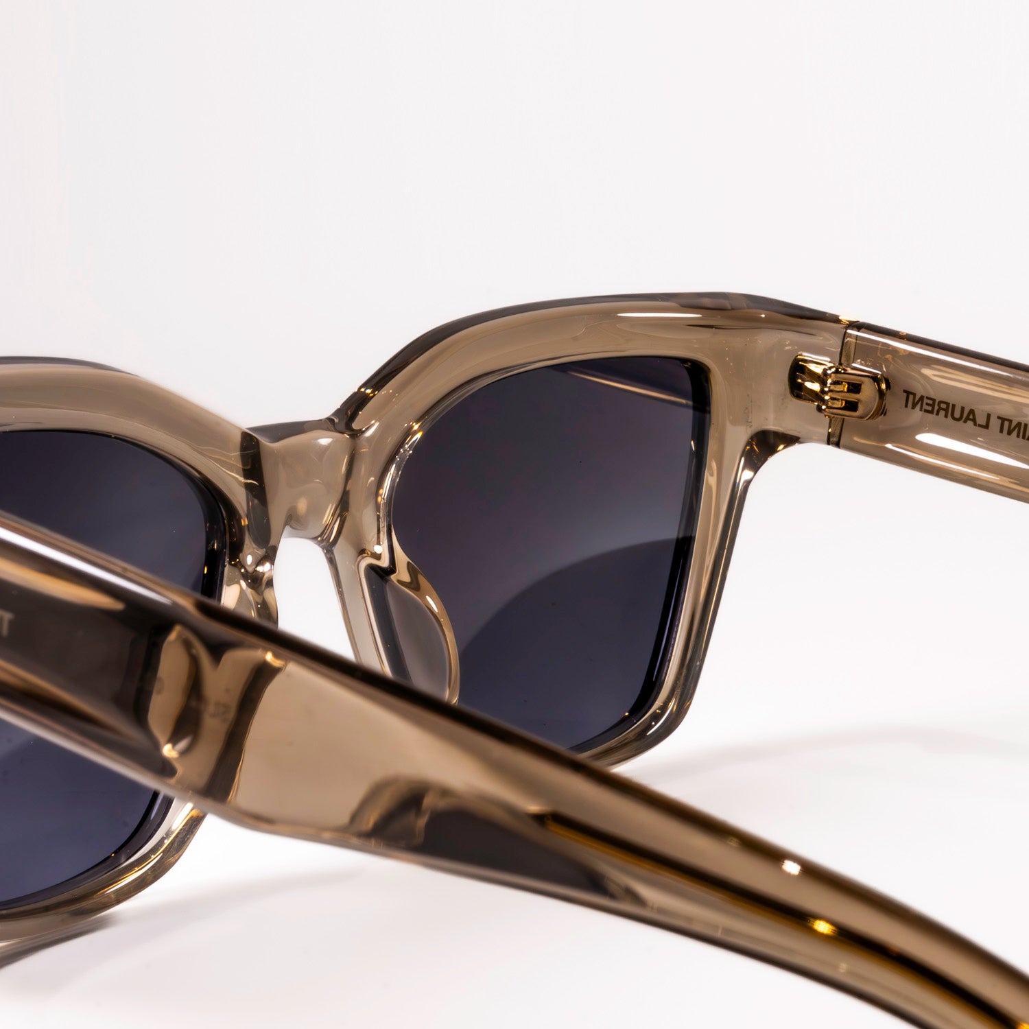 Saint Laurent Sunglasses SL-641 featuring a square black acetate frame and black lenses with logo engraving.