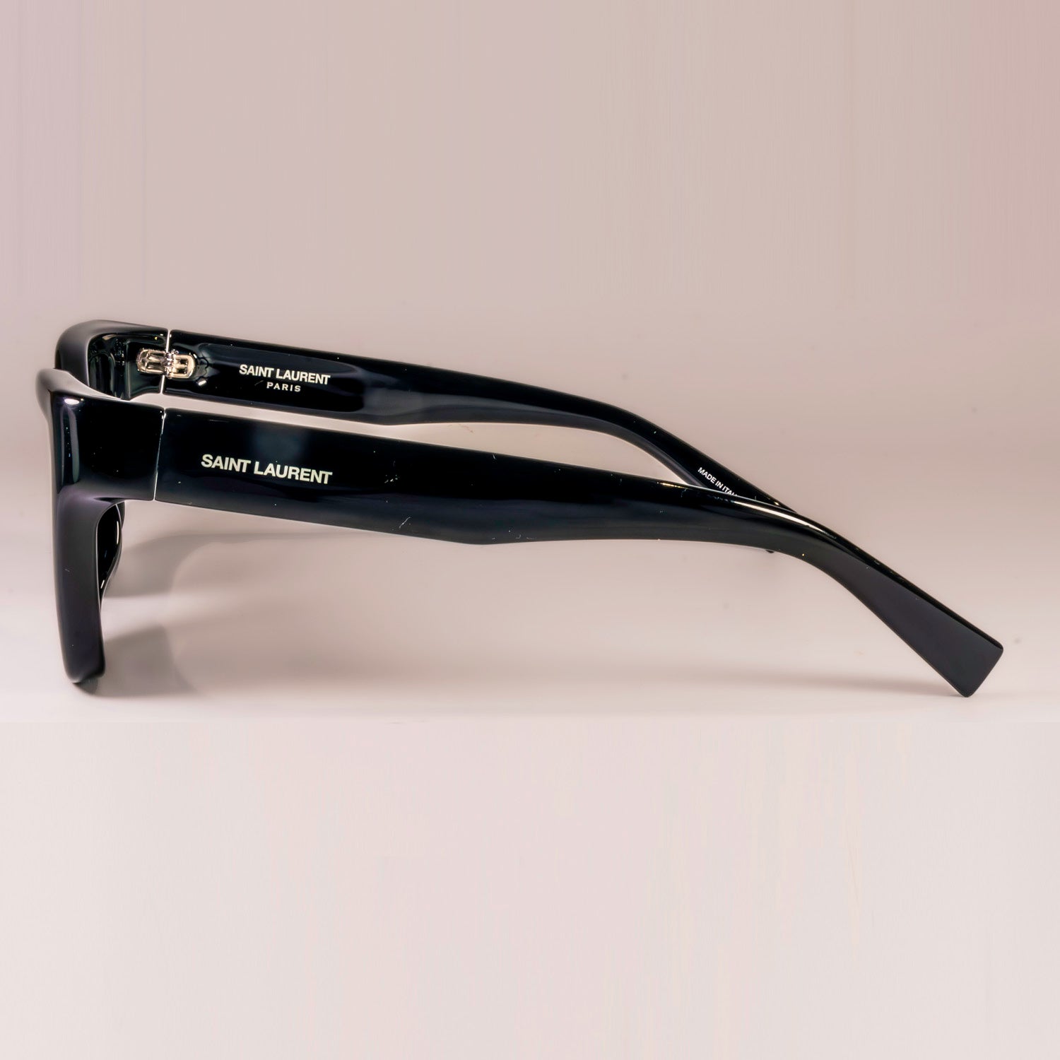 Saint Laurent Sunglasses SL-641 featuring a square black acetate frame and black lenses with logo engraving.