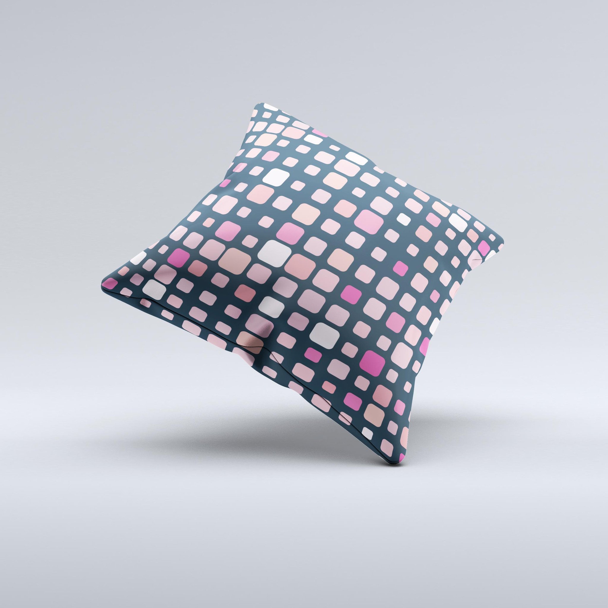 Handcrafted decorative throw pillow featuring scattered pink squared polka dots on a soft fabric, perfect for home decor.