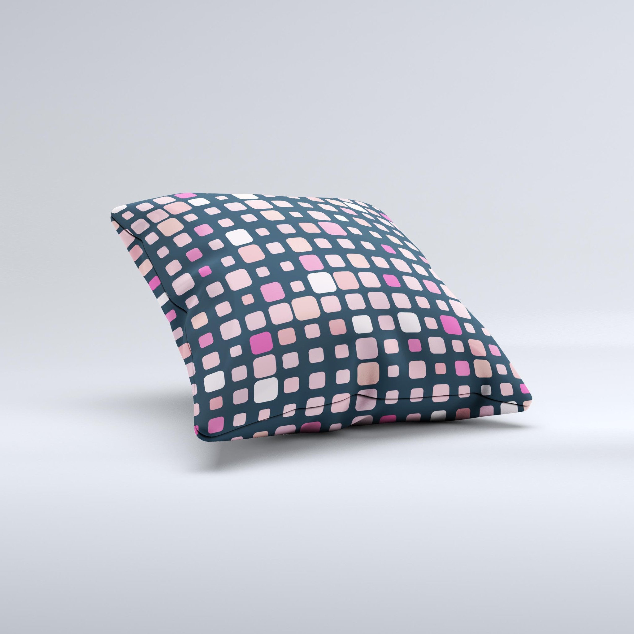 Handcrafted decorative throw pillow featuring scattered pink squared polka dots on a soft fabric, perfect for home decor.