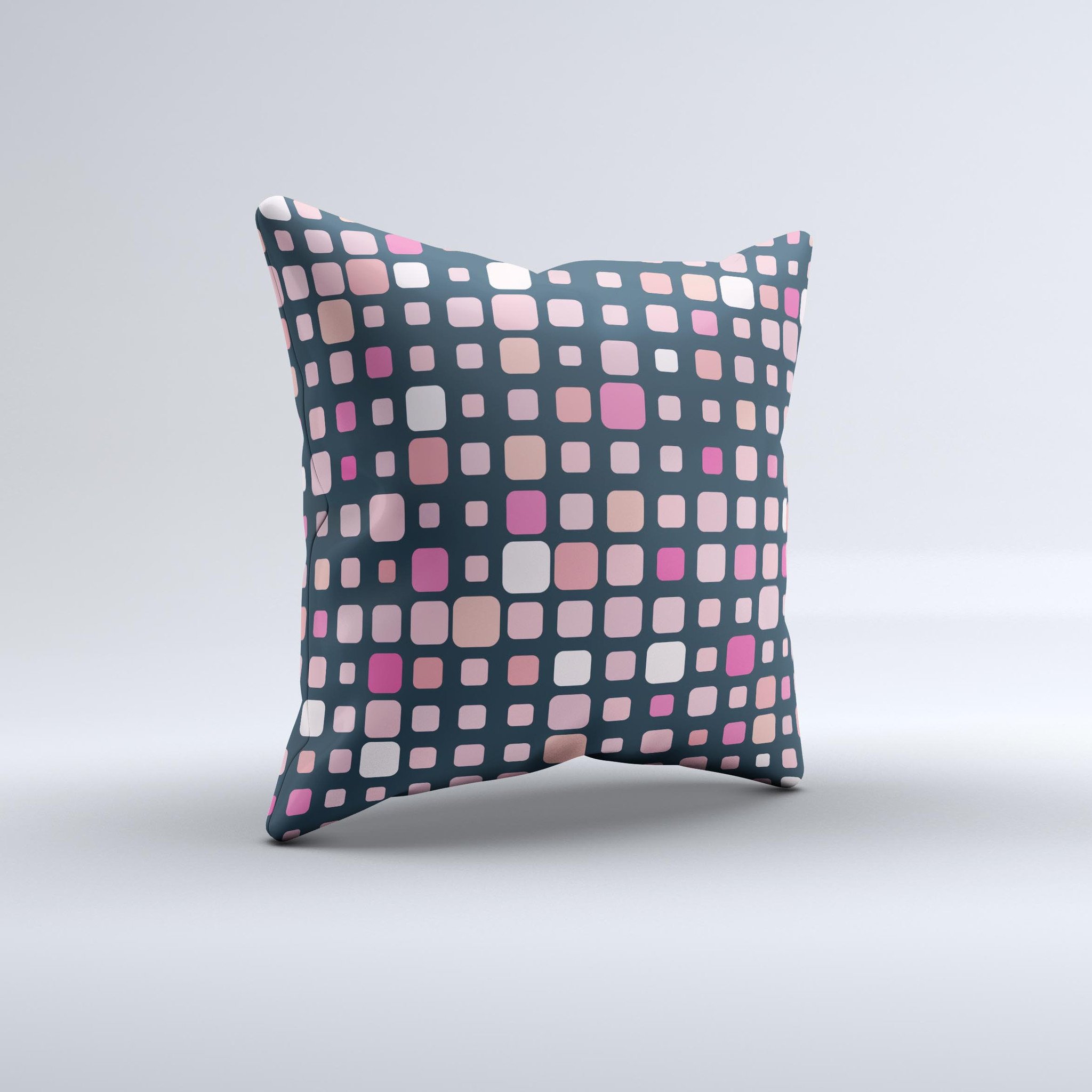 Handcrafted decorative throw pillow featuring scattered pink squared polka dots on a soft fabric, perfect for home decor.