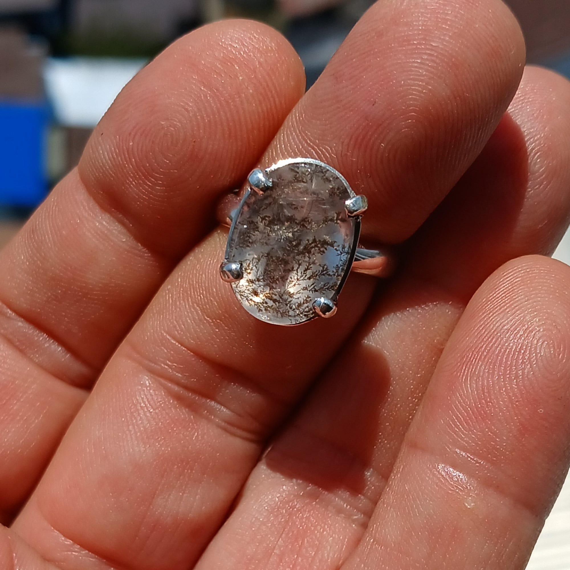 A stunning Scenic Dendrite Silver Ring featuring a round cut Dendrite Tree Agate set in polished sterling silver, showcasing unique natural patterns.