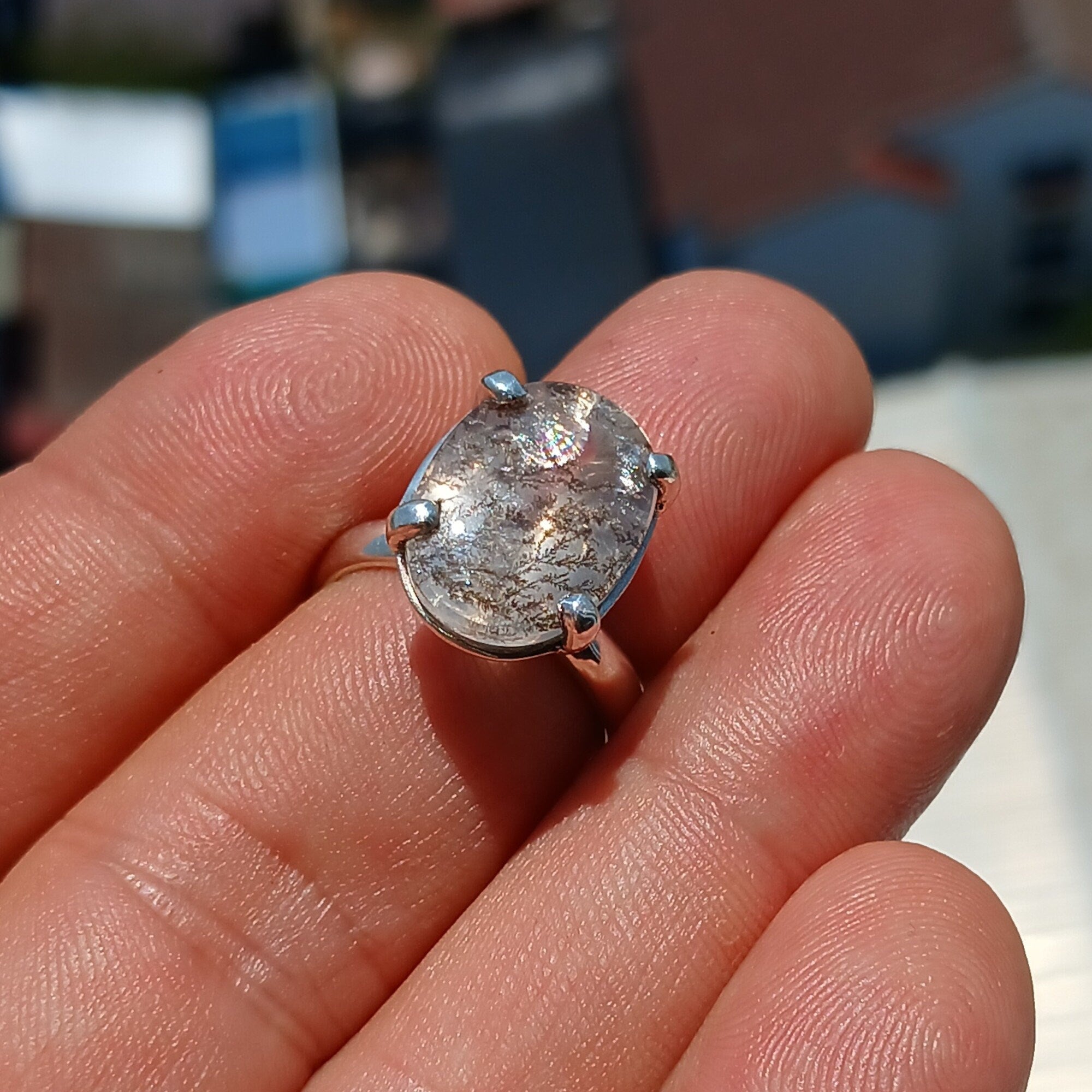 A stunning Scenic Dendrite Silver Ring featuring a round cut Dendrite Tree Agate set in polished sterling silver, showcasing unique natural patterns.