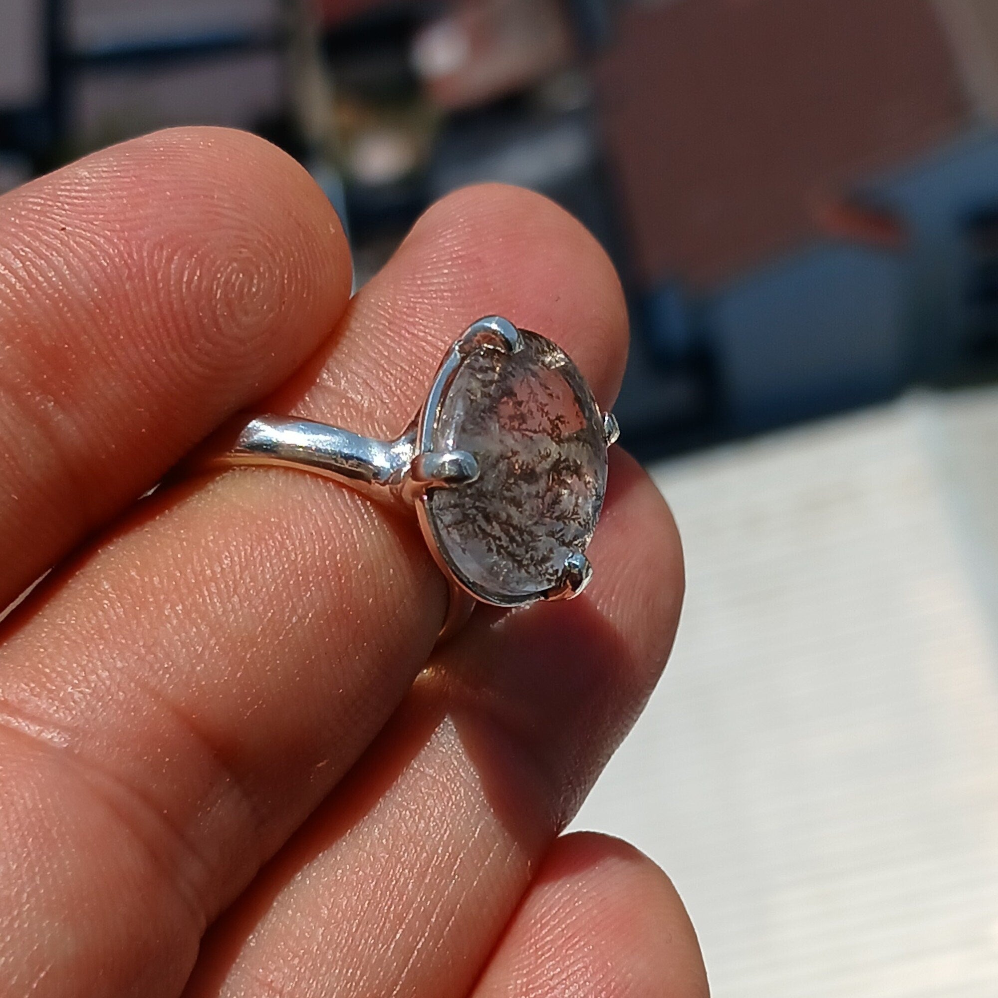 A stunning Scenic Dendrite Silver Ring featuring a round cut Dendrite Tree Agate set in polished sterling silver, showcasing unique natural patterns.