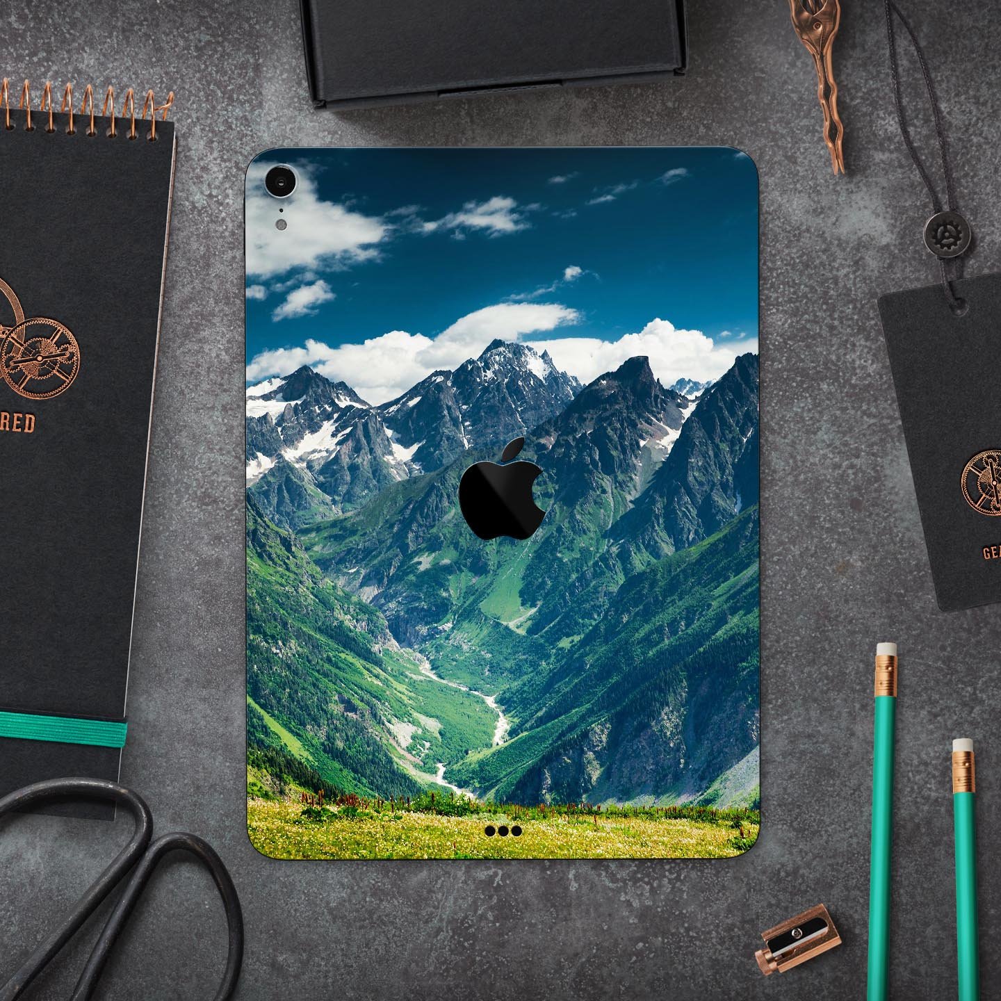 Scenic Mountaintops full body skin decal for Apple iPad Pro, showcasing a beautiful mountain landscape design.