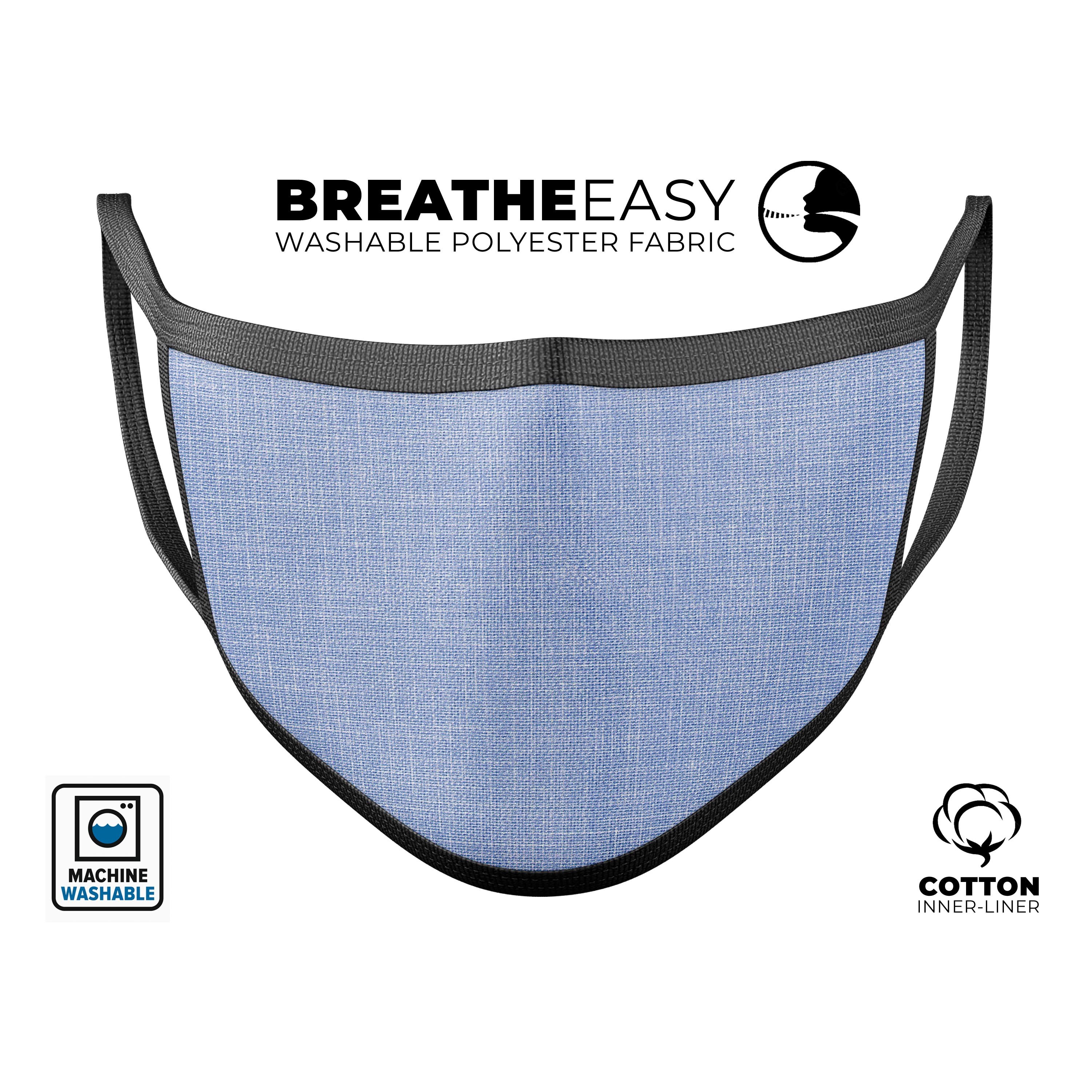 Dye-sublimated reusable 3D face mask with a scratched blue fabric pattern, adjustable ear loops, and soft cotton interior.