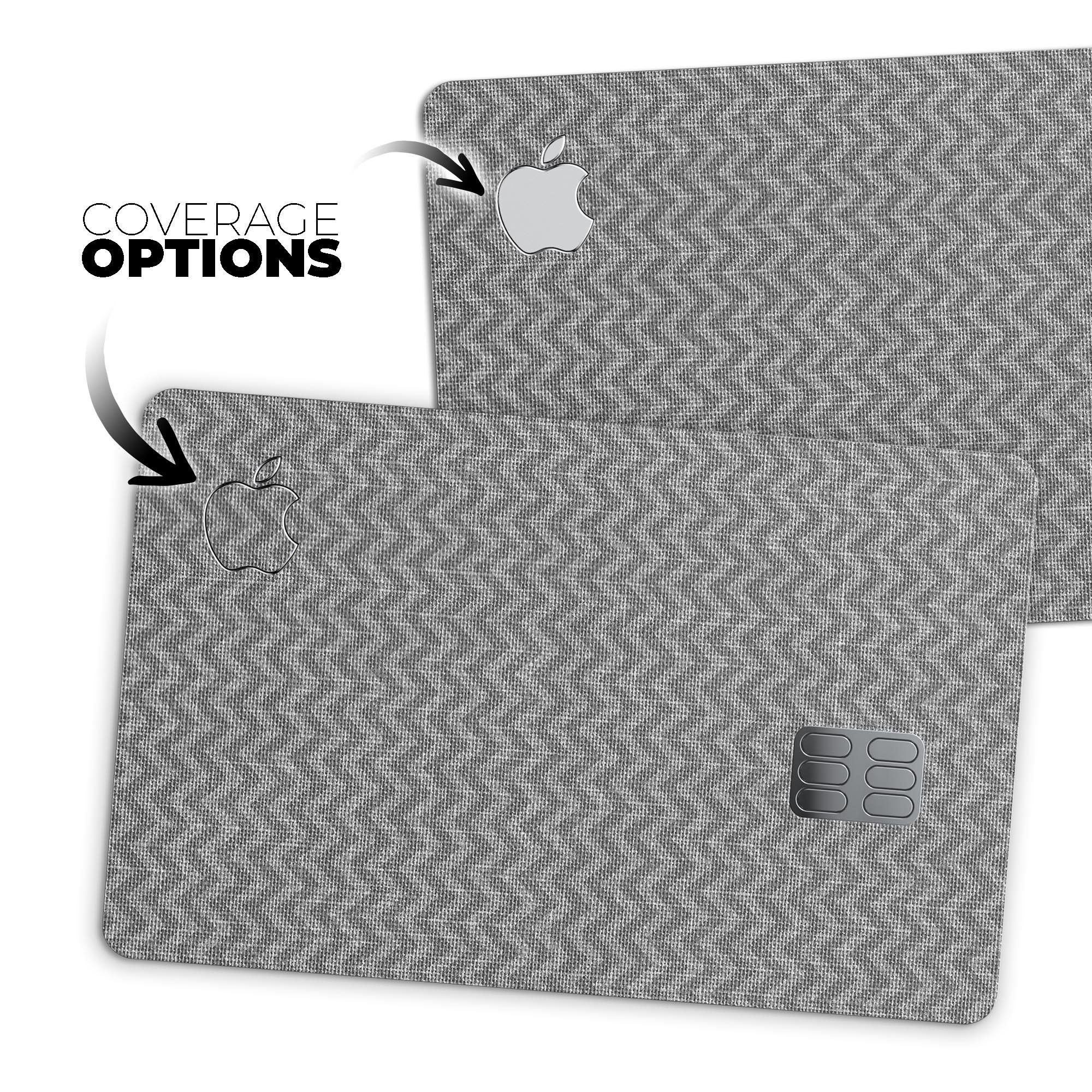 Scratched Chevron Over Gray Fabric decal skin applied to an Apple Card, showcasing its stylish design and premium quality.