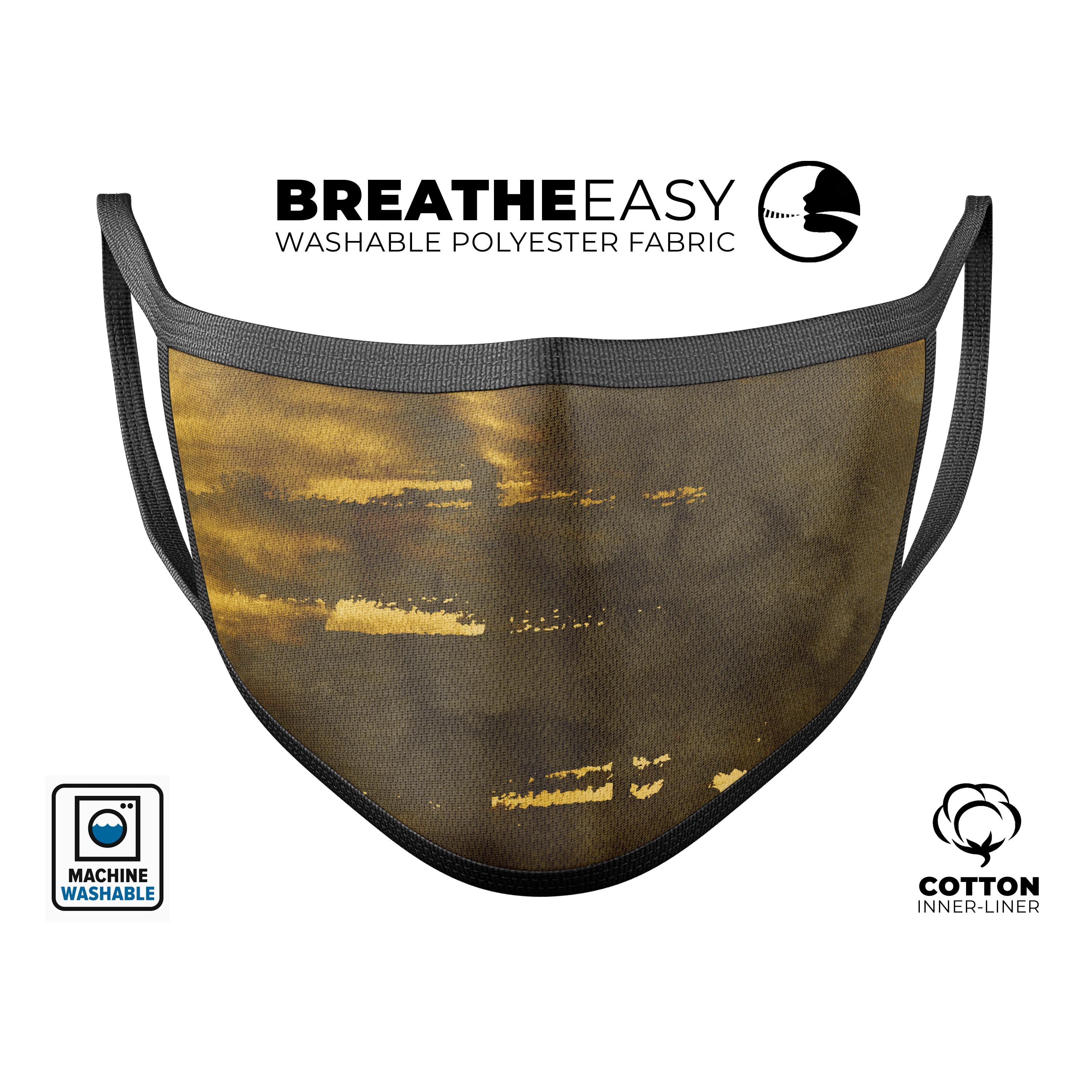 A stylish unisex mouth cover featuring a scratched golden surface design, made in the USA, showcasing its adjustable ear loops and comfortable cotton interior.