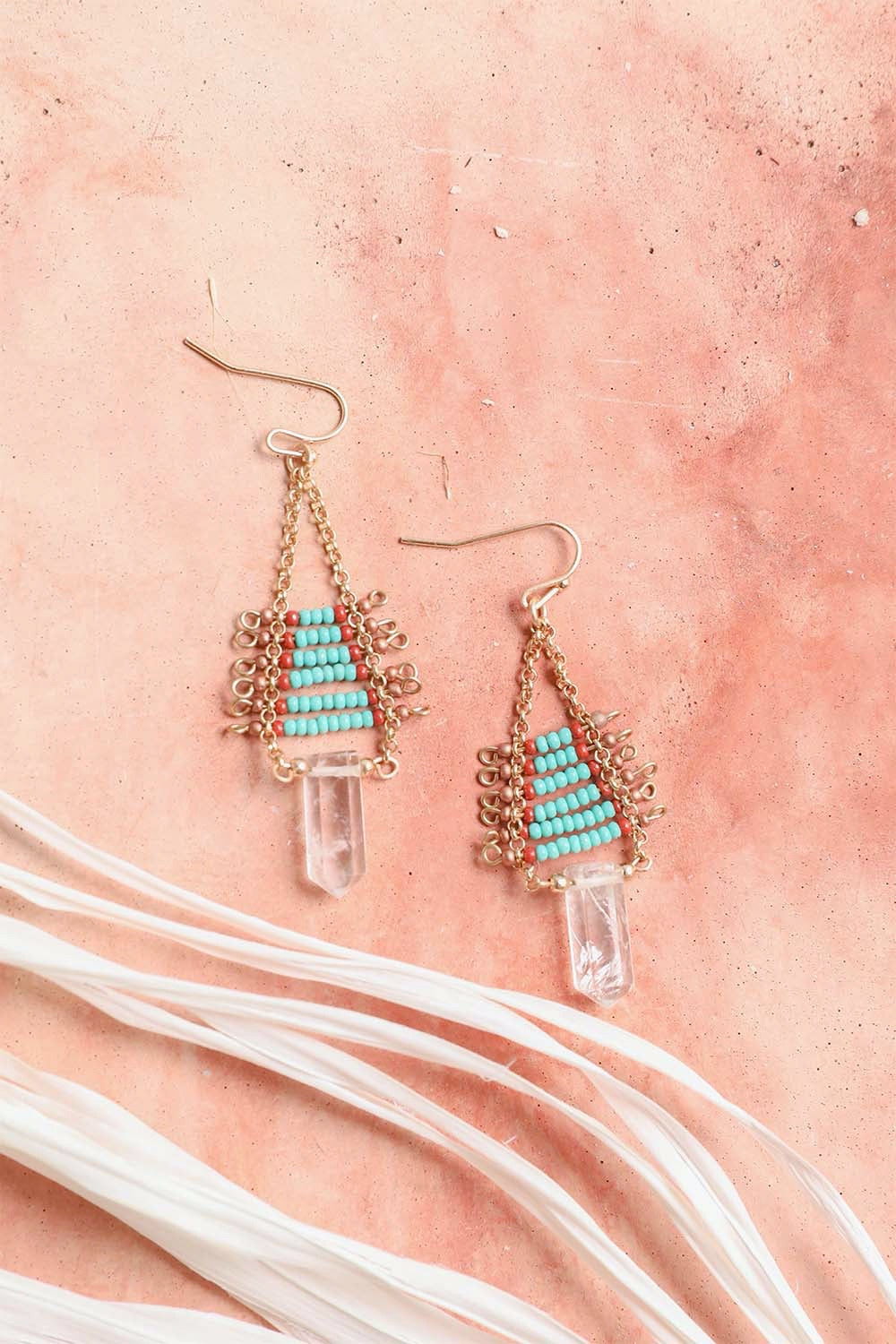 Elegant Seed Bead with Crystal Drop Earrings showcasing a stylish design with seed beads and sparkling crystal accents.