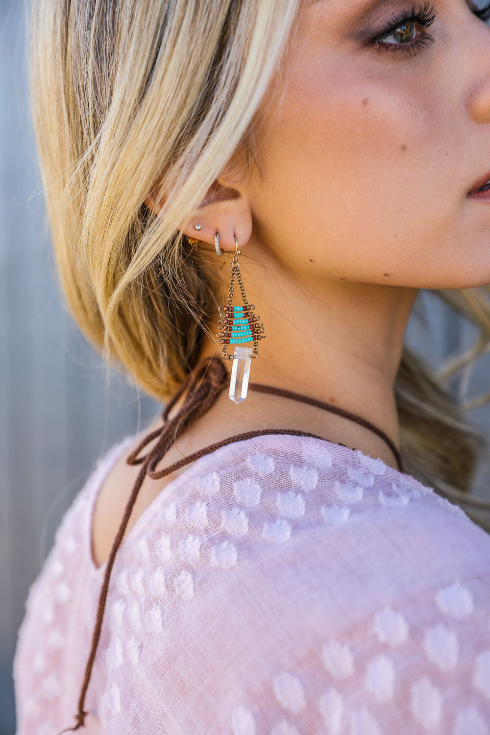 Elegant Seed Bead with Crystal Drop Earrings showcasing a stylish design with seed beads and sparkling crystal accents.