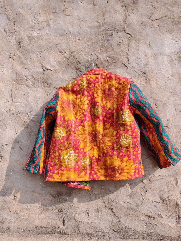 Shoma Vintage Kantha Jacket featuring intricate embroidery and a structured collar, made from repurposed vintage fabric.