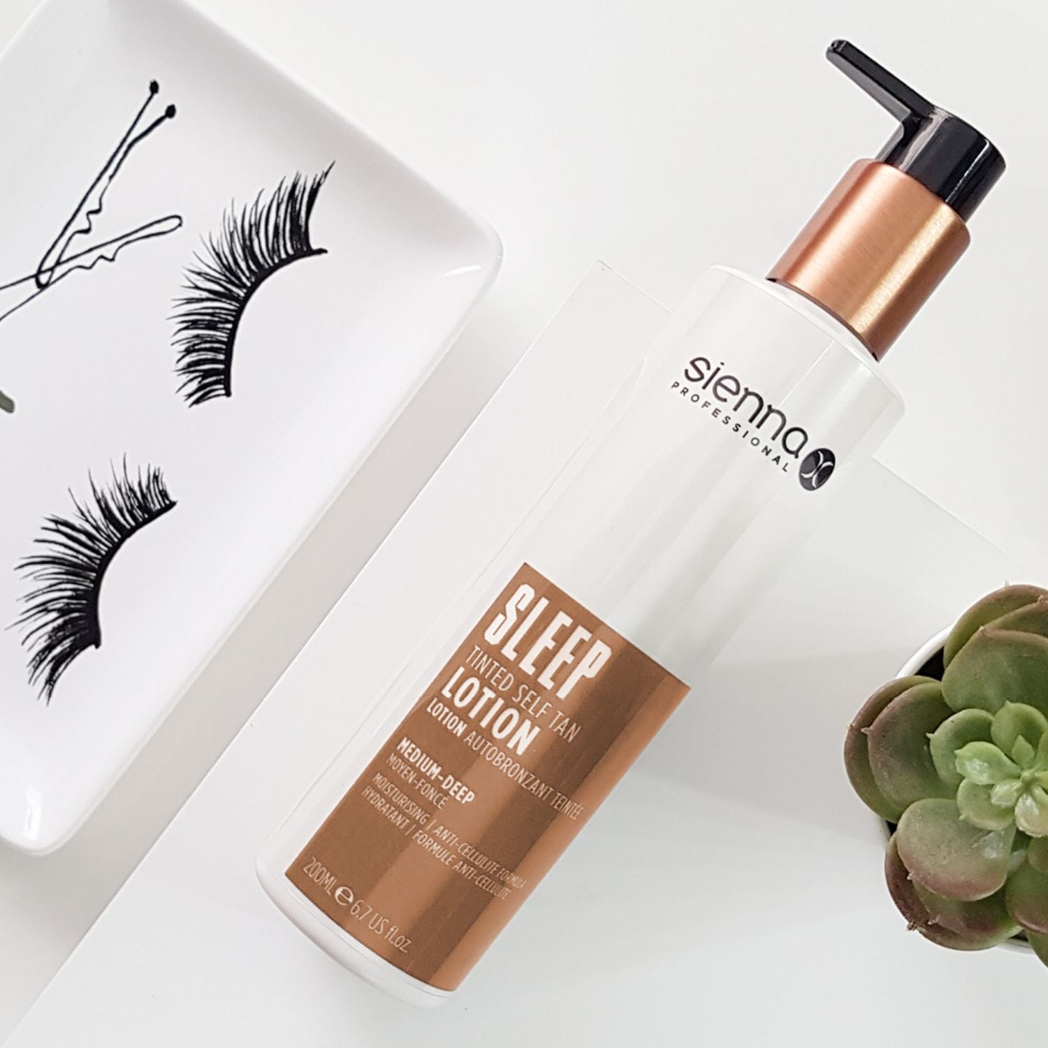 Sienna X SLEEP Tinted Self Tan Lotion bottle with a sleek design, showcasing its vegan and anti-cellulite formula for a flawless tan.