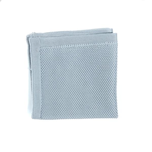 A stylish silver knitted pocket square, measuring 23cm x 23cm, made from soft polyester, perfect for formal occasions.