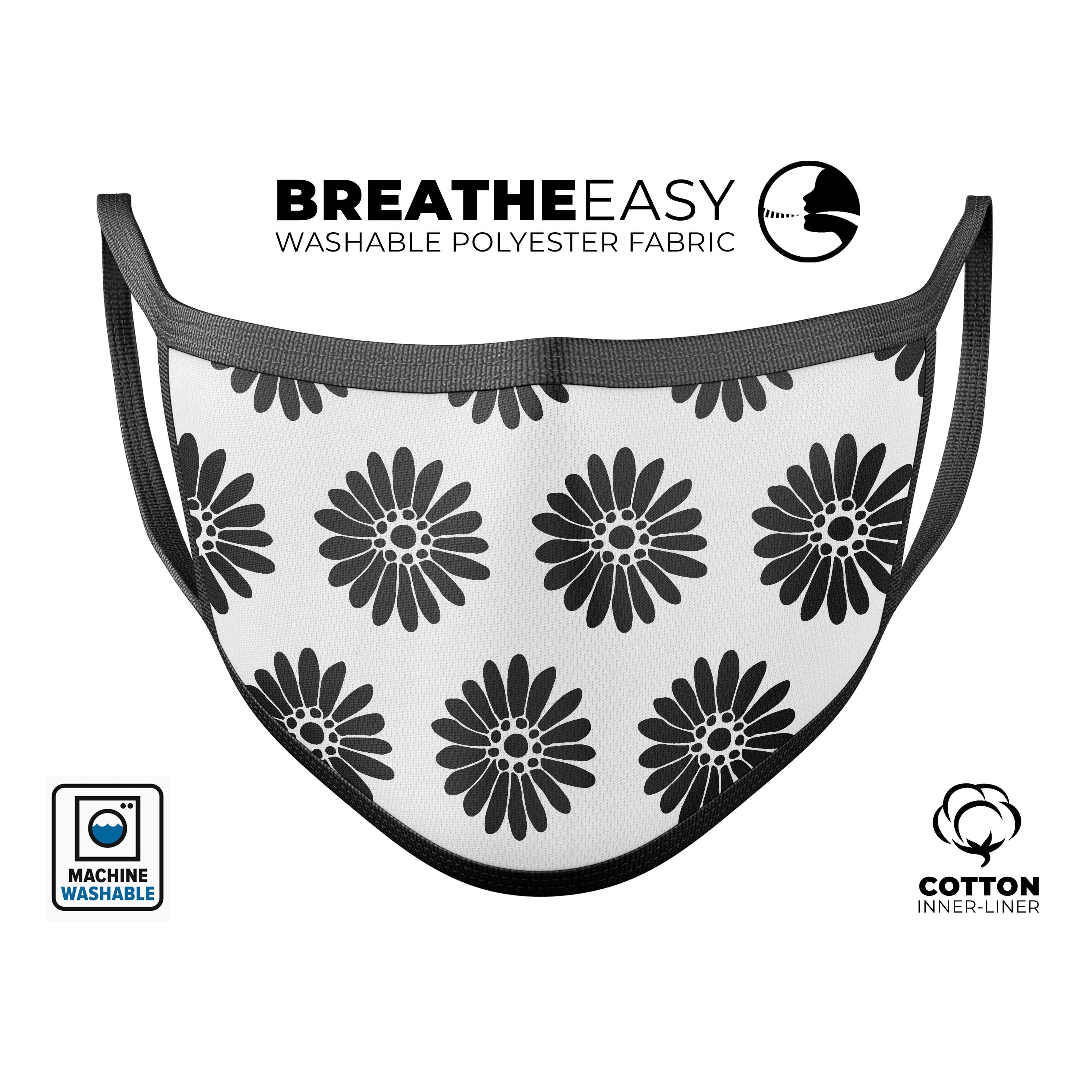 Slate Black Daisy's Mouth Cover with Translucent Backing, showcasing a stylish floral design and adjustable ear-loops.