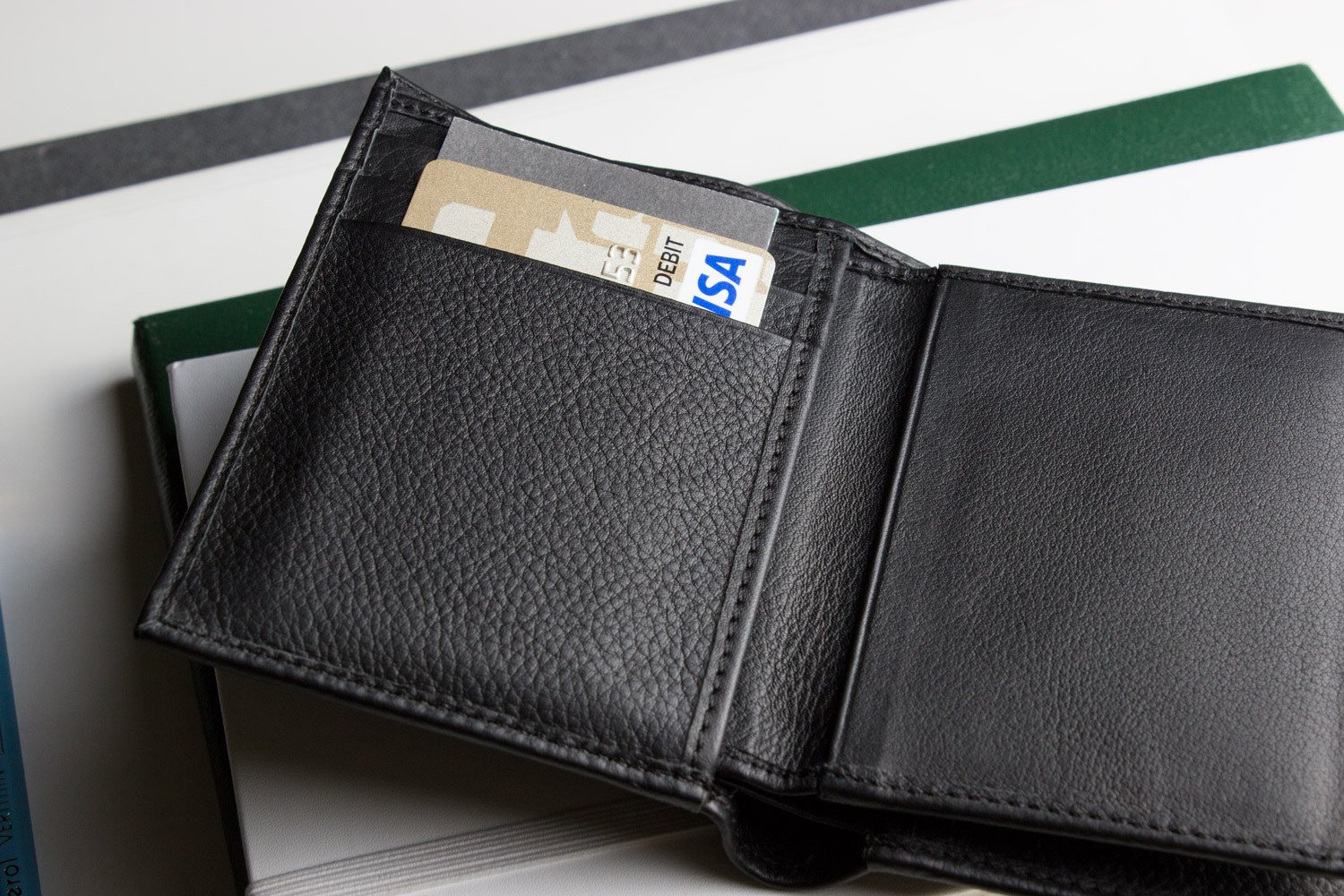 Slimfold Passcase Wallet made of butter soft full grain cowhide leather, featuring 6 card slots and a removable ID case.