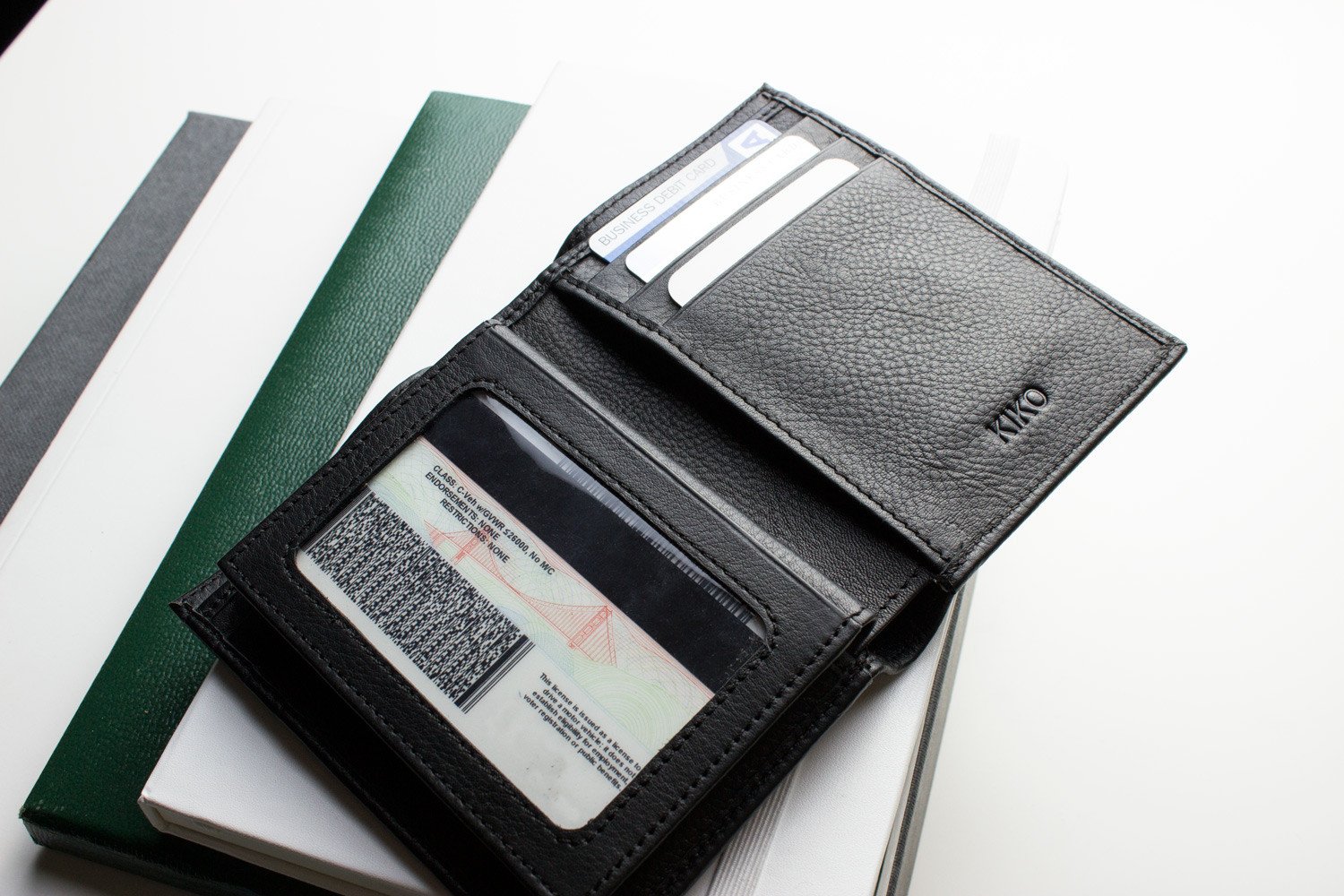 Slimfold Passcase Wallet made of butter soft full grain cowhide leather, featuring 6 card slots and a removable ID case.