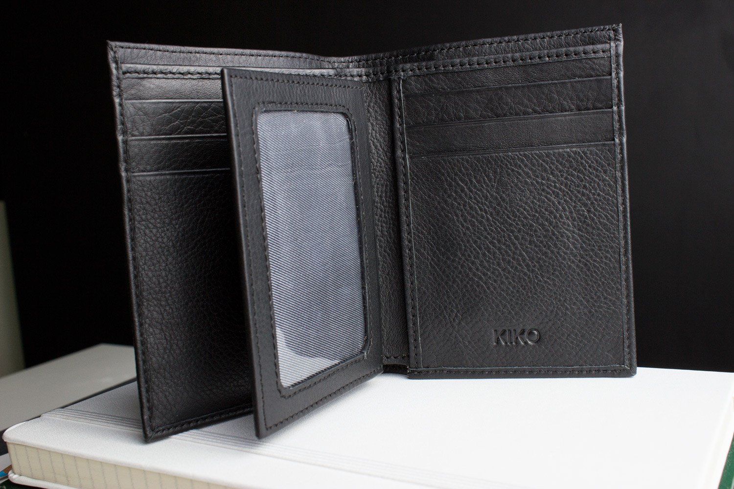 Slimfold Passcase Wallet made of butter soft full grain cowhide leather, featuring 6 card slots and a removable ID case.