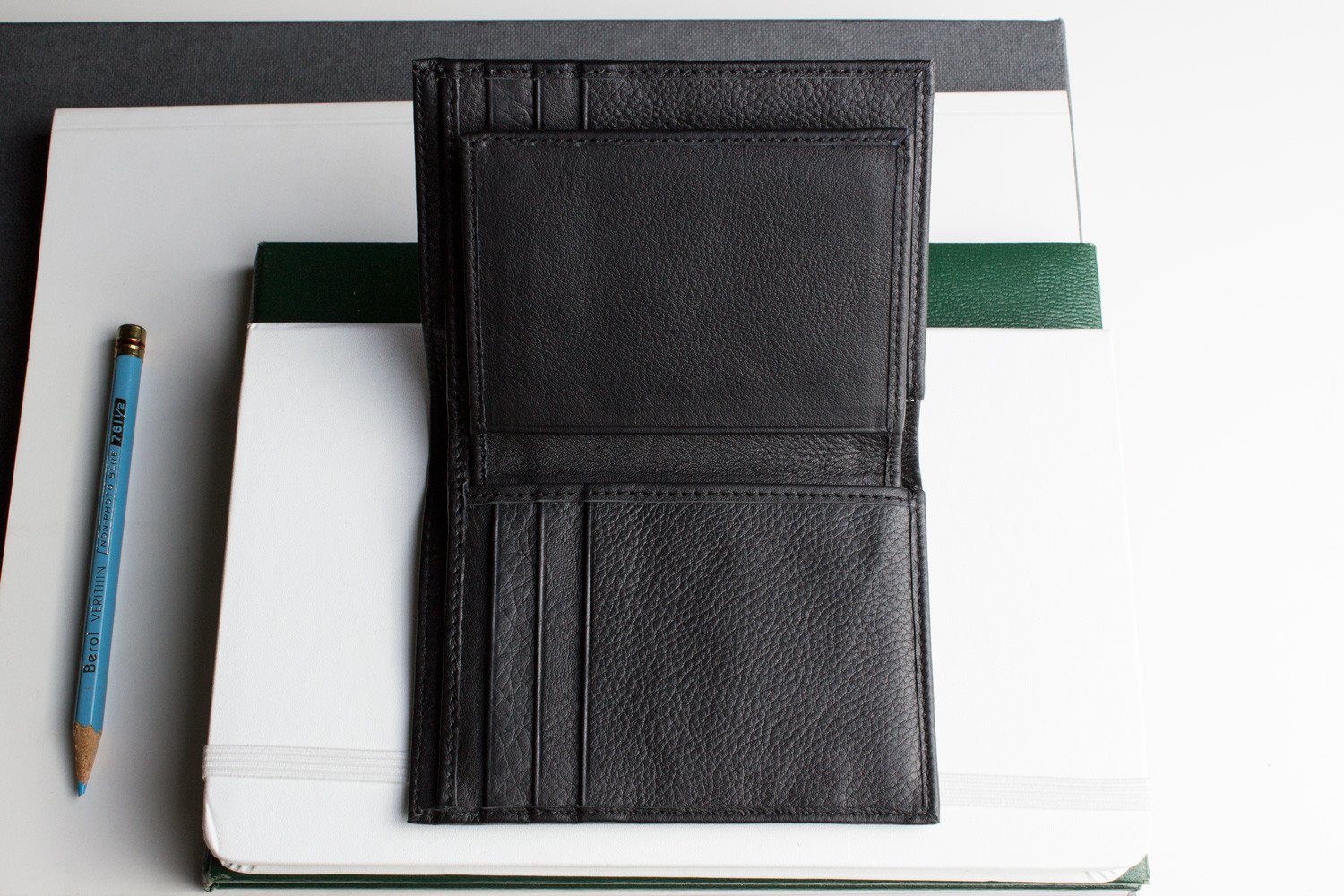 Slimfold Passcase Wallet made of butter soft full grain cowhide leather, featuring 6 card slots and a removable ID case.