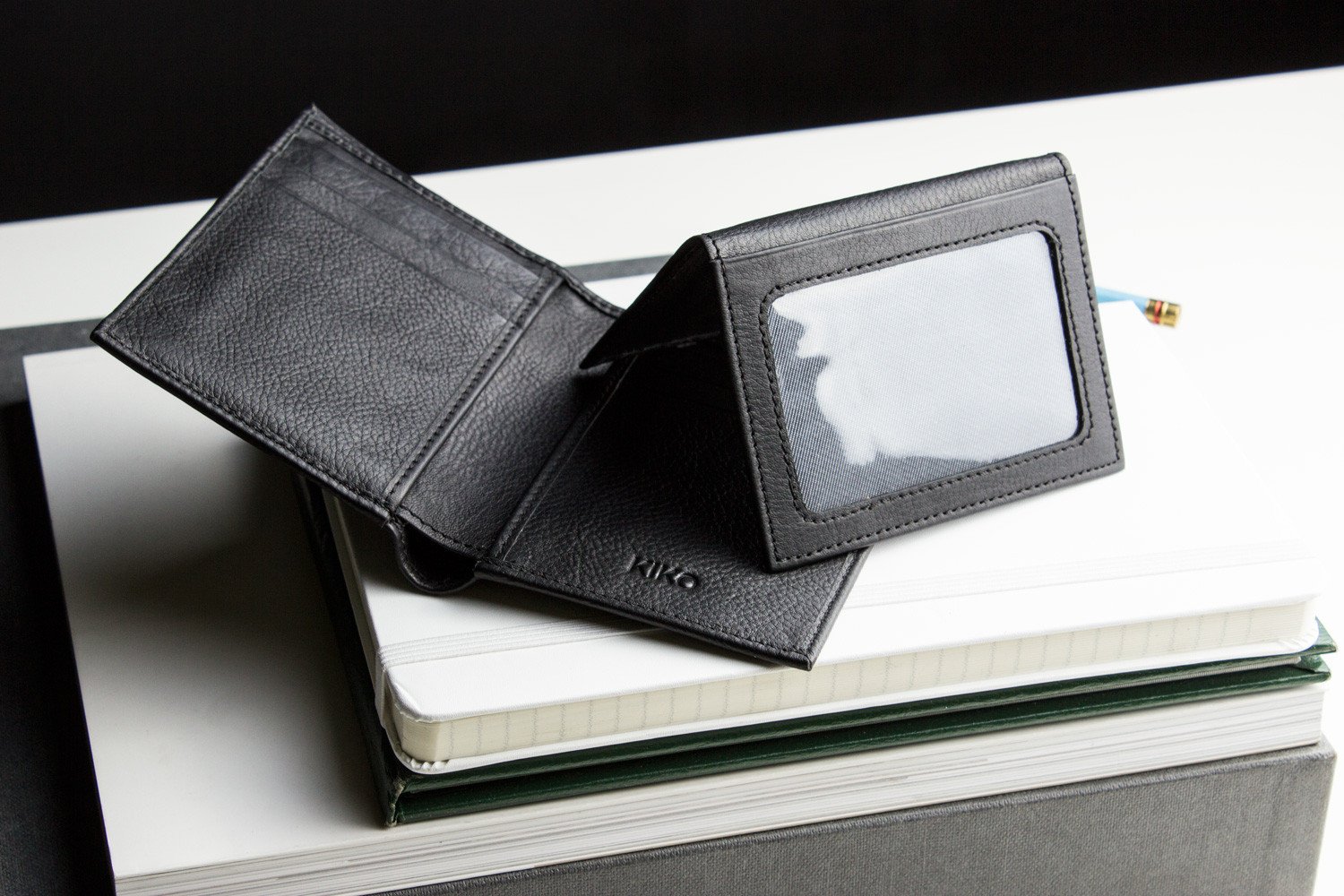 Slimfold Passcase Wallet made of butter soft full grain cowhide leather, featuring 6 card slots and a removable ID case.