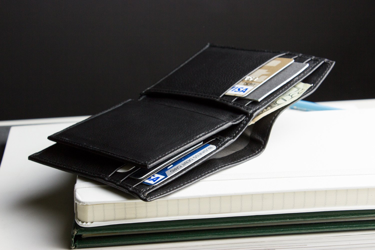 Slimfold Passcase Wallet made of butter soft full grain cowhide leather, featuring 6 card slots and a removable ID case.