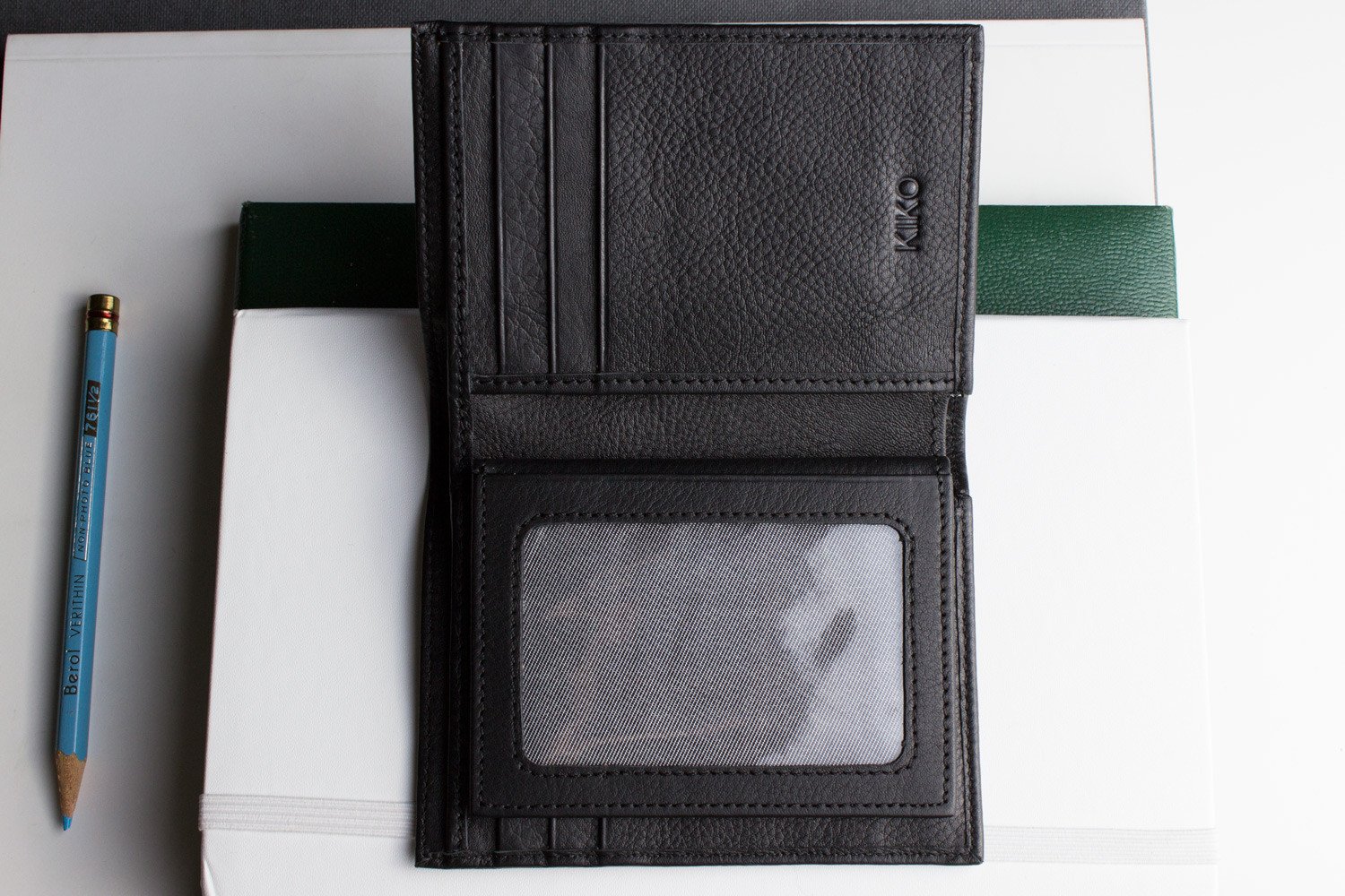 Slimfold Passcase Wallet made of butter soft full grain cowhide leather, featuring 6 card slots and a removable ID case.