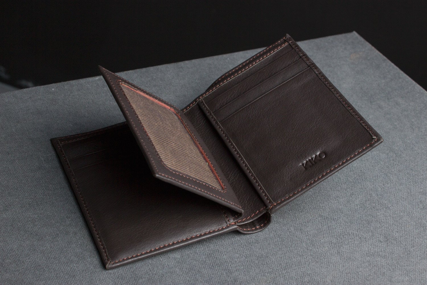 Slimfold Passcase Wallet made of butter soft full grain cowhide leather, featuring 6 card slots and a removable ID case.