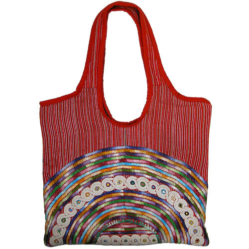 Small Joyabaj Handbag handcrafted from colorful Guatemalan huipils, showcasing unique patterns and vibrant colors.