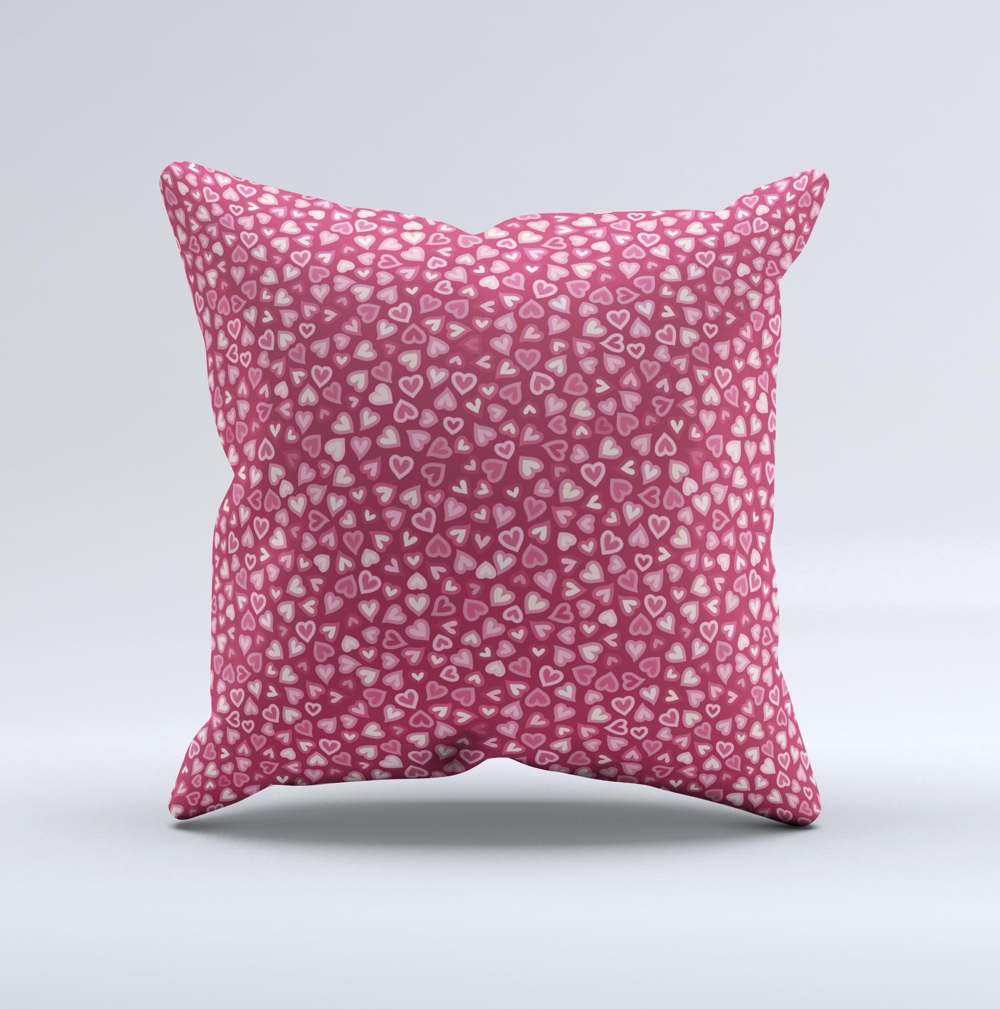 Small pink hearts collage decorative throw pillow, handmade in Virginia with high thread count fabric and plush filling.