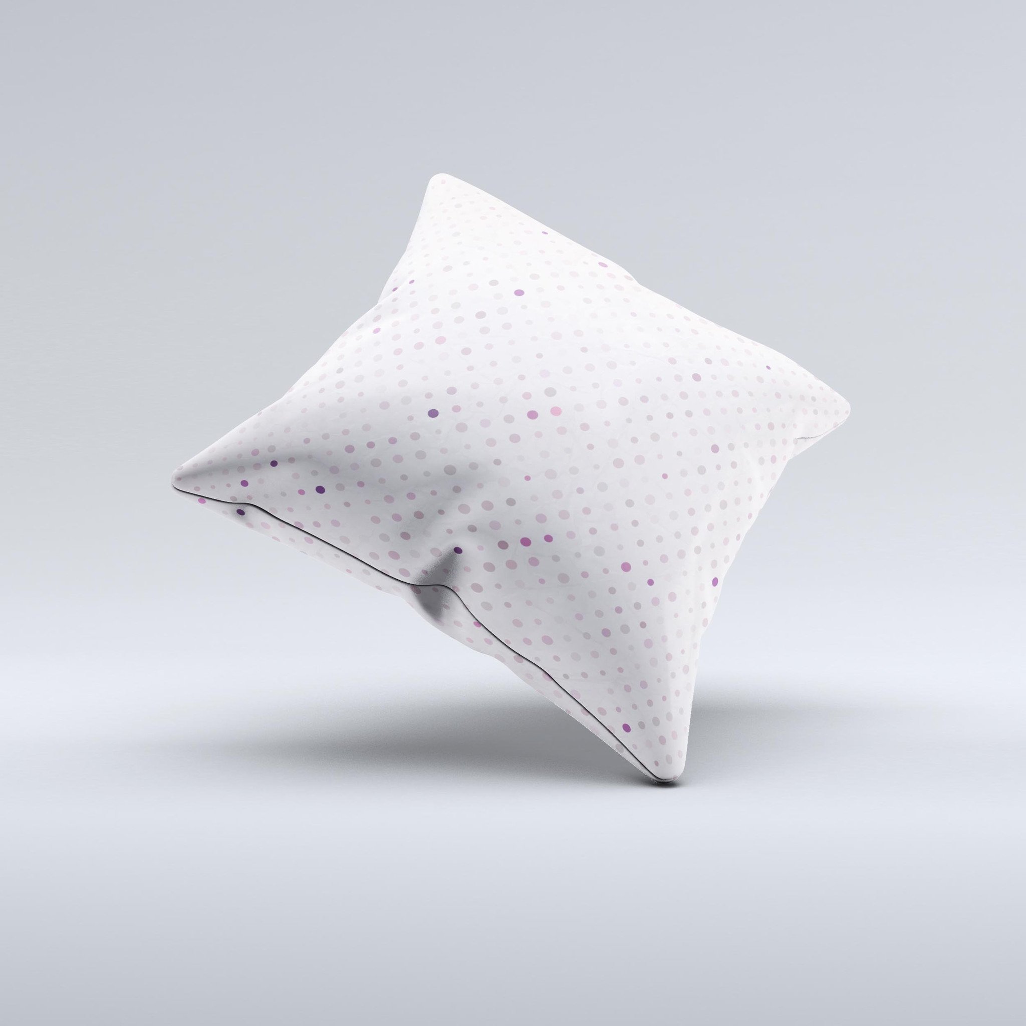 Small pink decorative throw pillow with polkadots, handcrafted in Virginia, featuring high thread count fabric and non-allergenic filling.