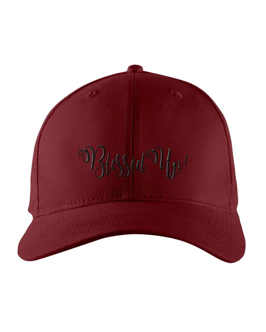 Blessed Up Snapback Cap featuring embroidered graphic, structured design, and adjustable snapback closure.