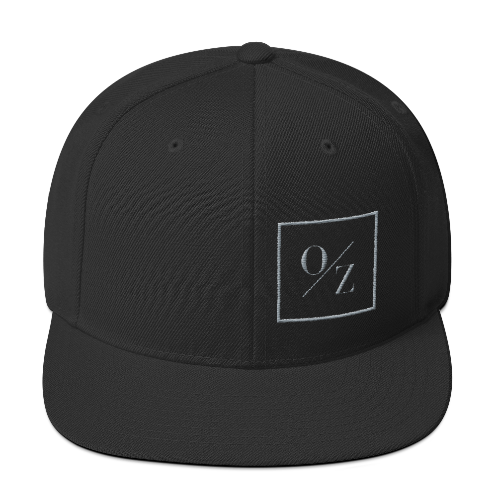 A stylish Snapback Hat with a flat brim, structured design, and puff embroidered O/Z logo on the front.