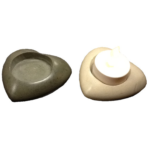 Handcrafted soapstone heart tealight holder, showcasing intricate carvings and a warm, inviting design, perfect for tealight candles.