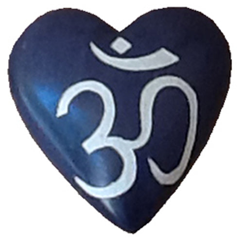 Handcrafted soapstone heart featuring an etched Om symbol, showcasing vibrant colors and smooth finish, symbolizing spirituality and artisan craftsmanship.