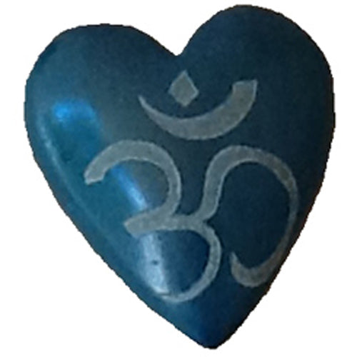 Handcrafted soapstone heart featuring an etched Om symbol, showcasing vibrant colors and smooth finish, symbolizing spirituality and artisan craftsmanship.