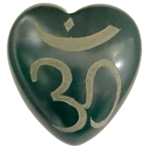 Handcrafted soapstone heart featuring an etched Om symbol, showcasing vibrant colors and smooth finish, symbolizing spirituality and artisan craftsmanship.