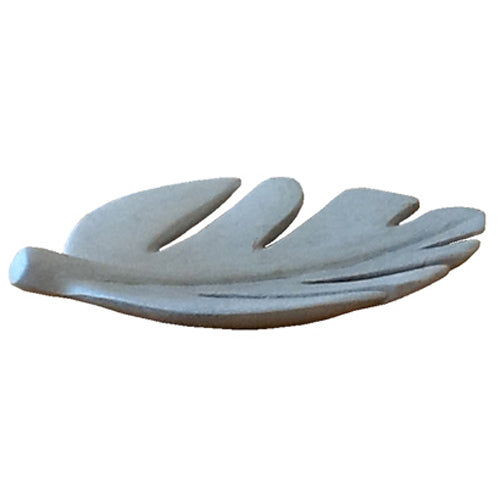 Hand carved soapstone leaf dish showcasing intricate design by Haitian artisans, perfect for decor or serving.