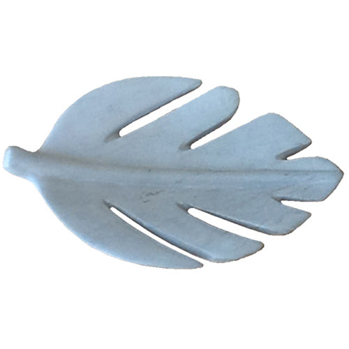 Hand carved soapstone leaf dish showcasing intricate design by Haitian artisans, perfect for decor or serving.